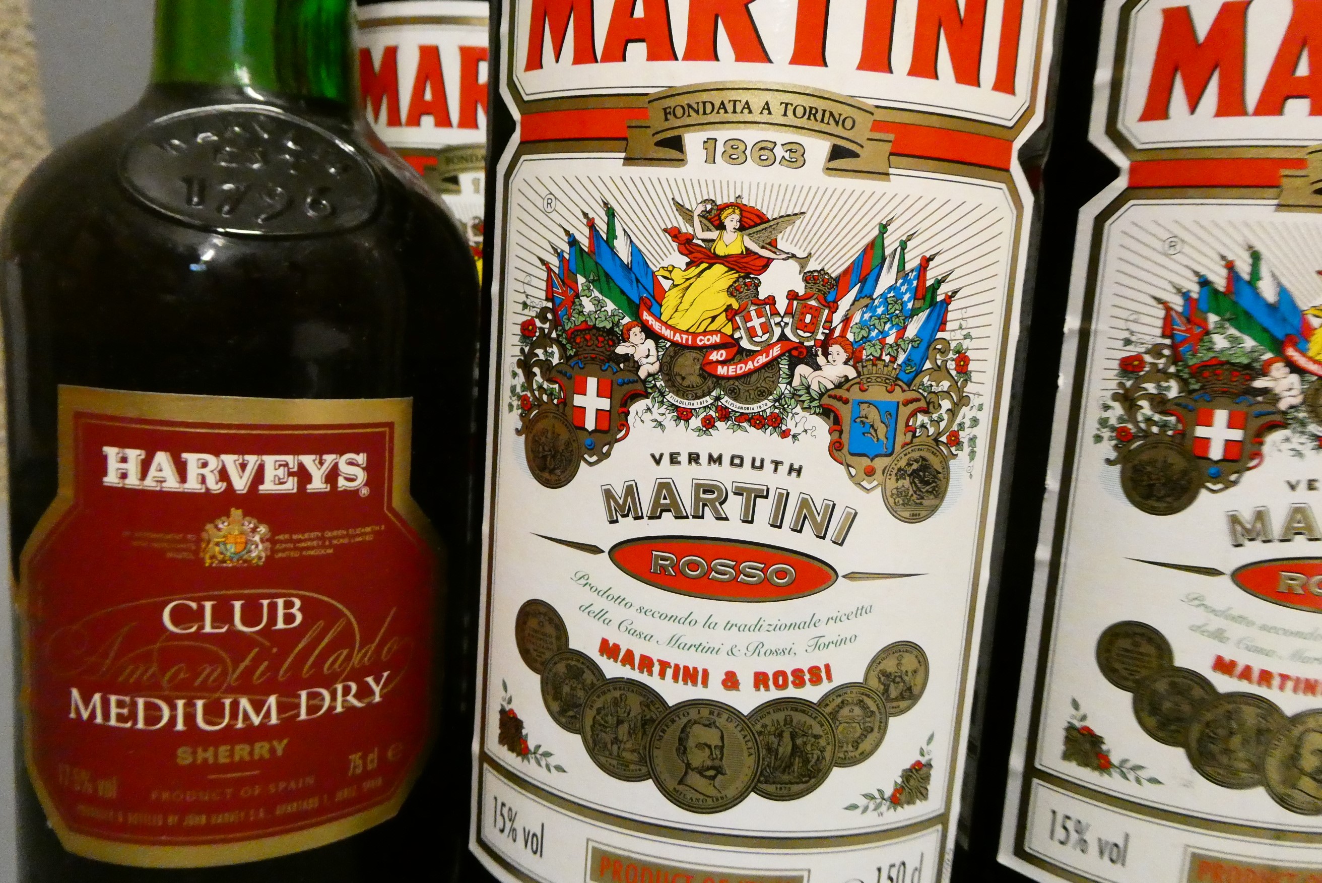 Thirteen bottles comprising four 150cl Martini, seven 75cl Martini Extra Dry, one 75cl Harvey's Image