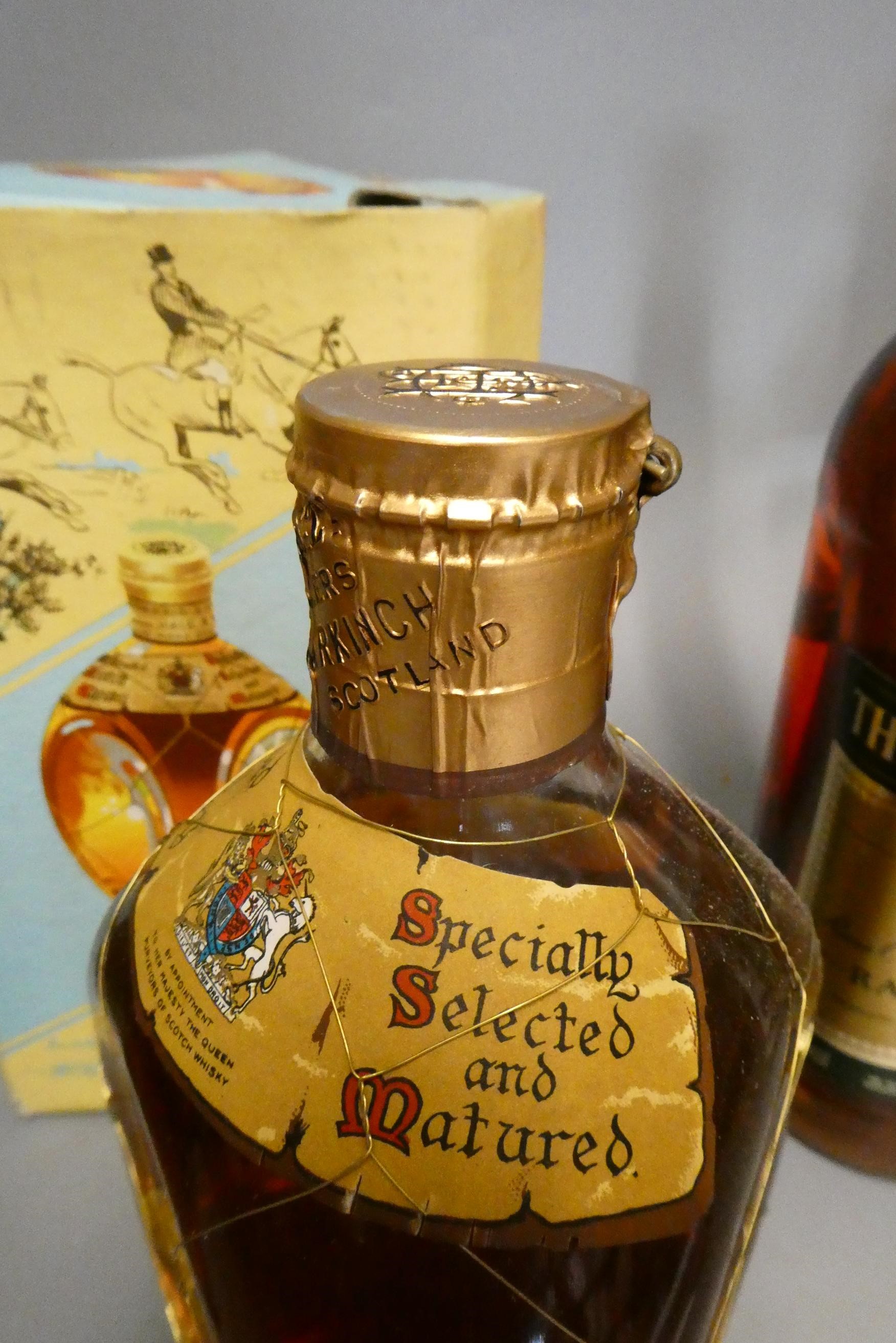 Seven bottles of mixed spirits Image