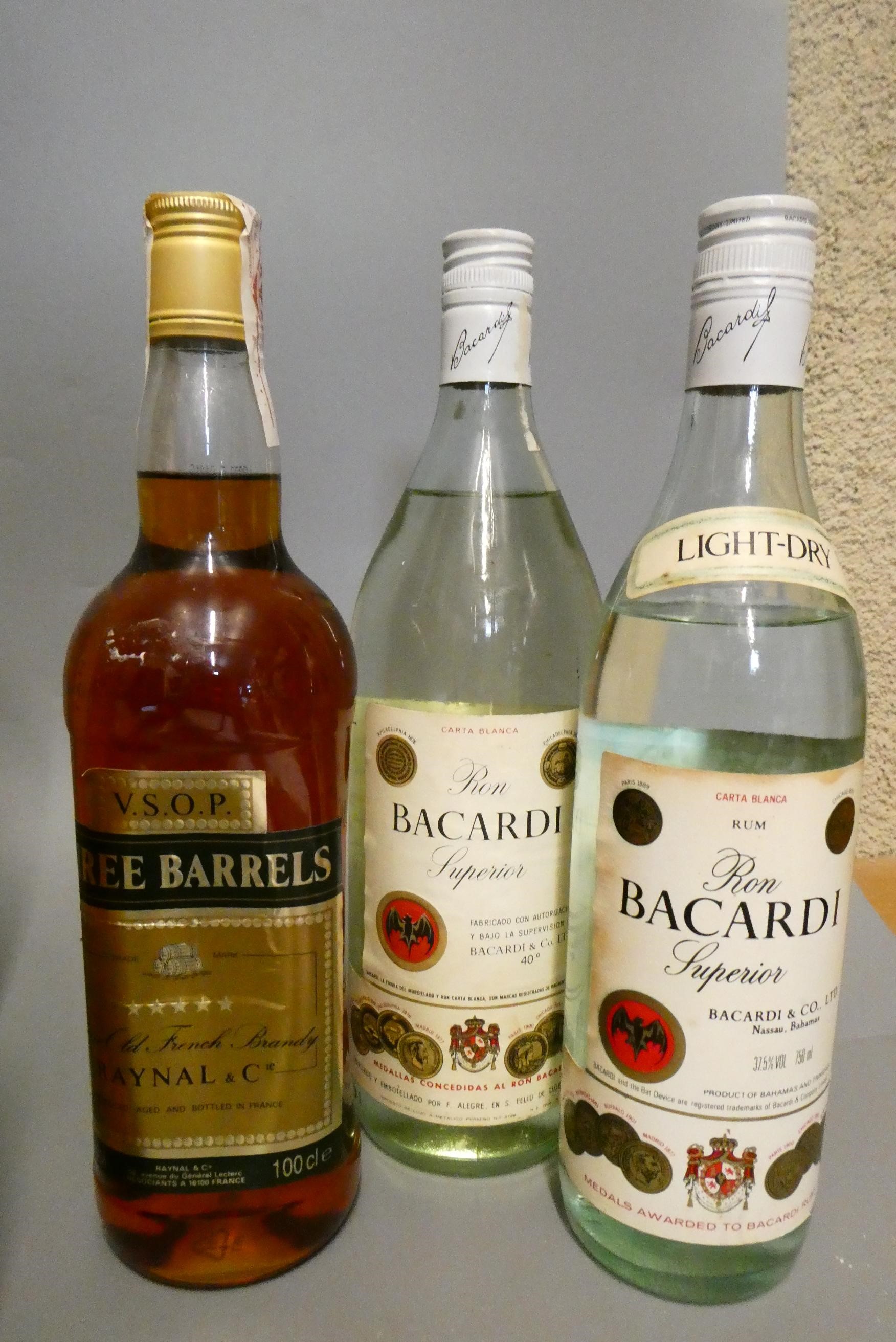 Seven bottles of mixed spirits Image