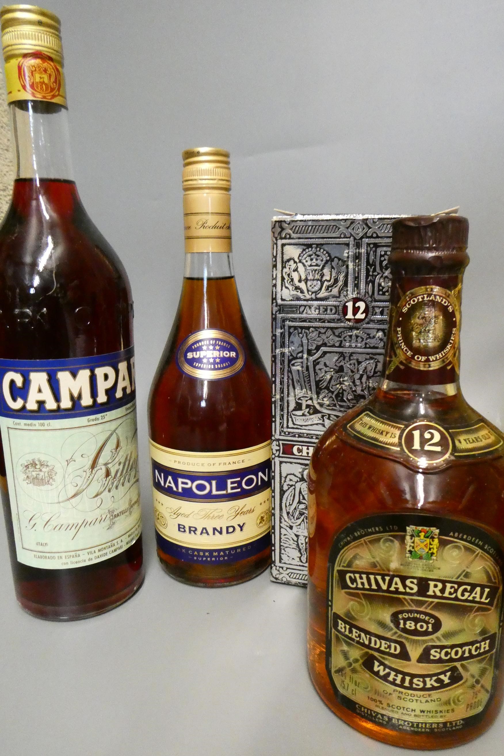 Seven bottles of mixed spirits Image