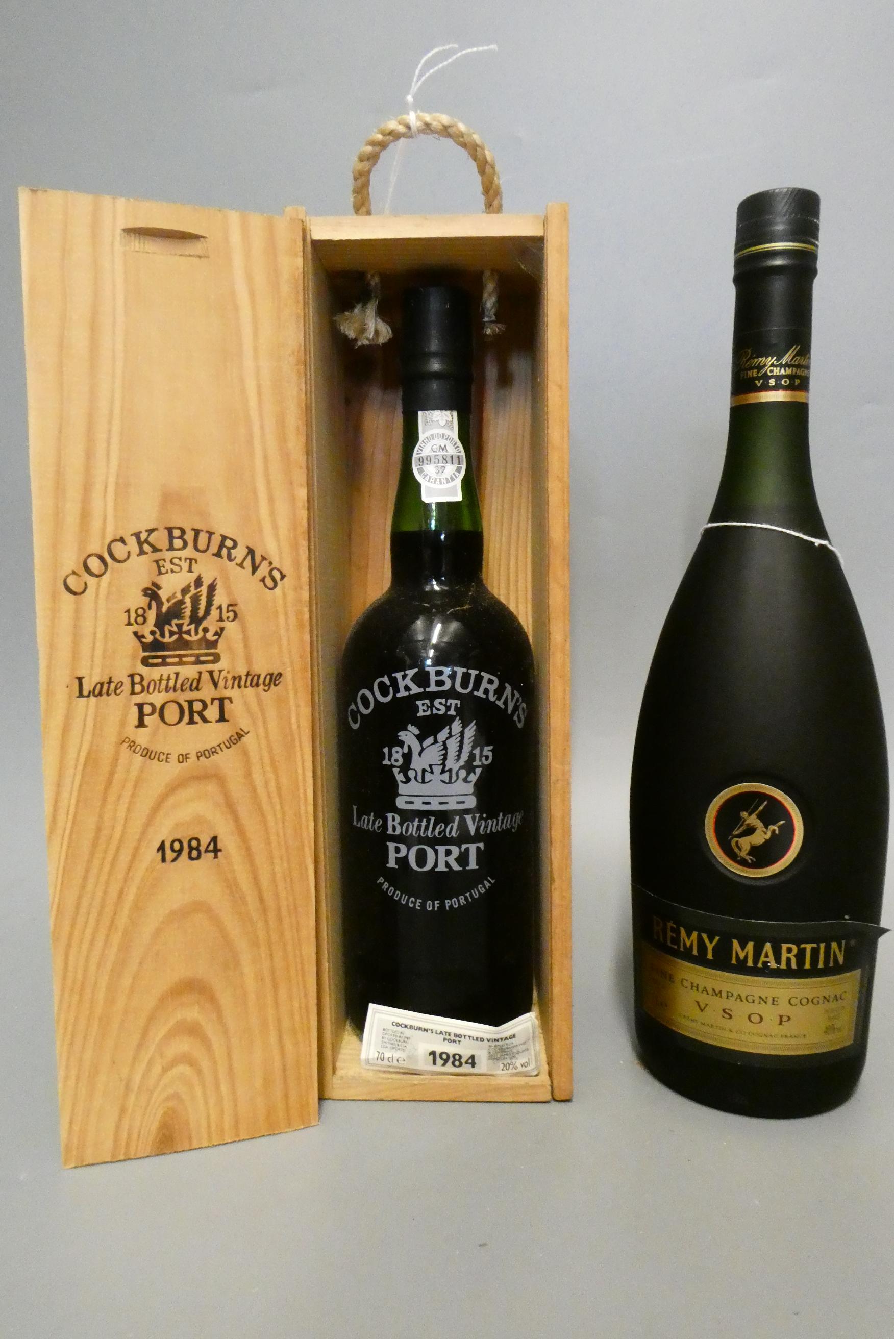 Two bottles comprising a boxed Cockburn's LBV 1984 port, and a 1litre Remy Martin VSOP fine Image