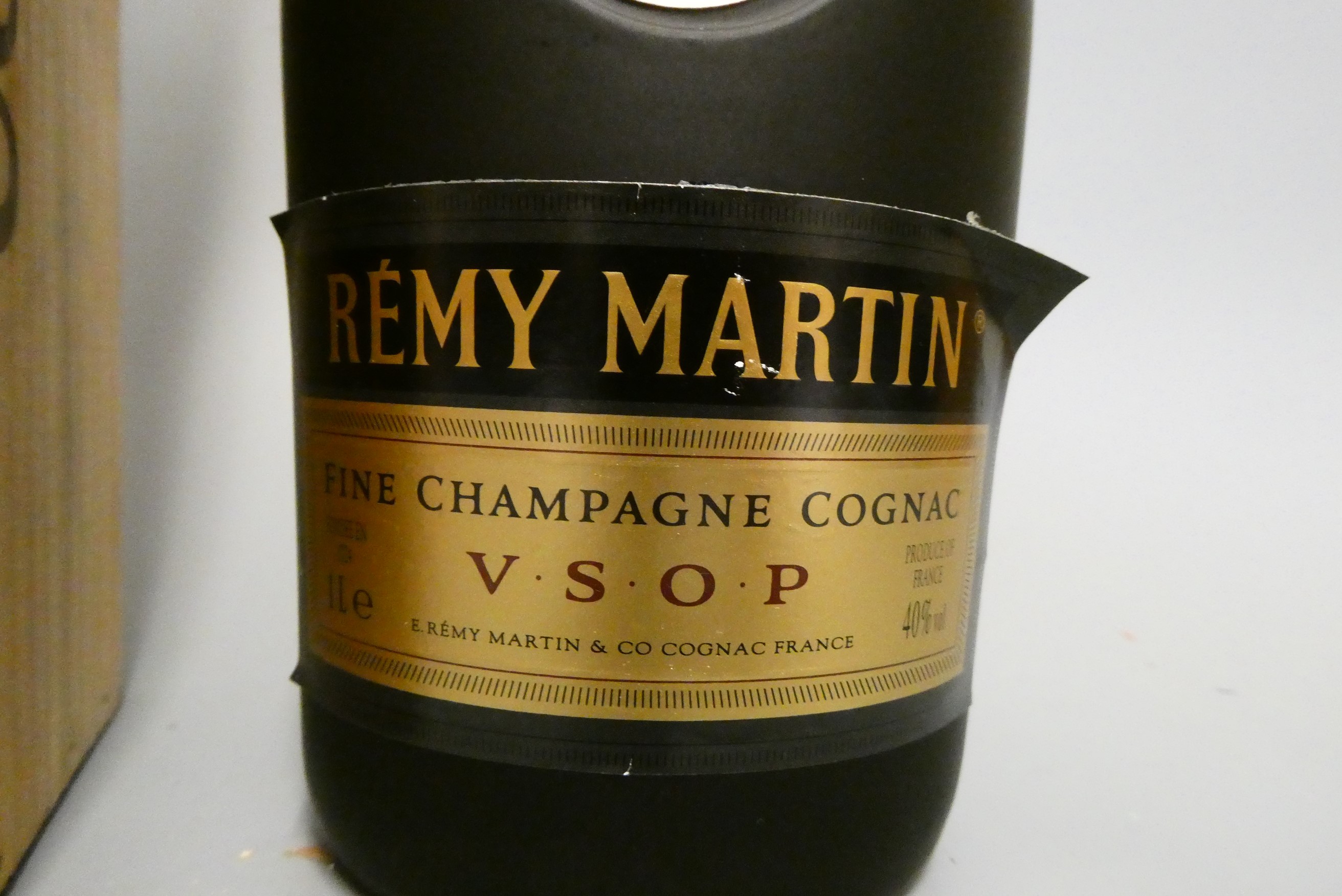 Two bottles comprising a boxed Cockburn's LBV 1984 port, and a 1litre Remy Martin VSOP fine Image