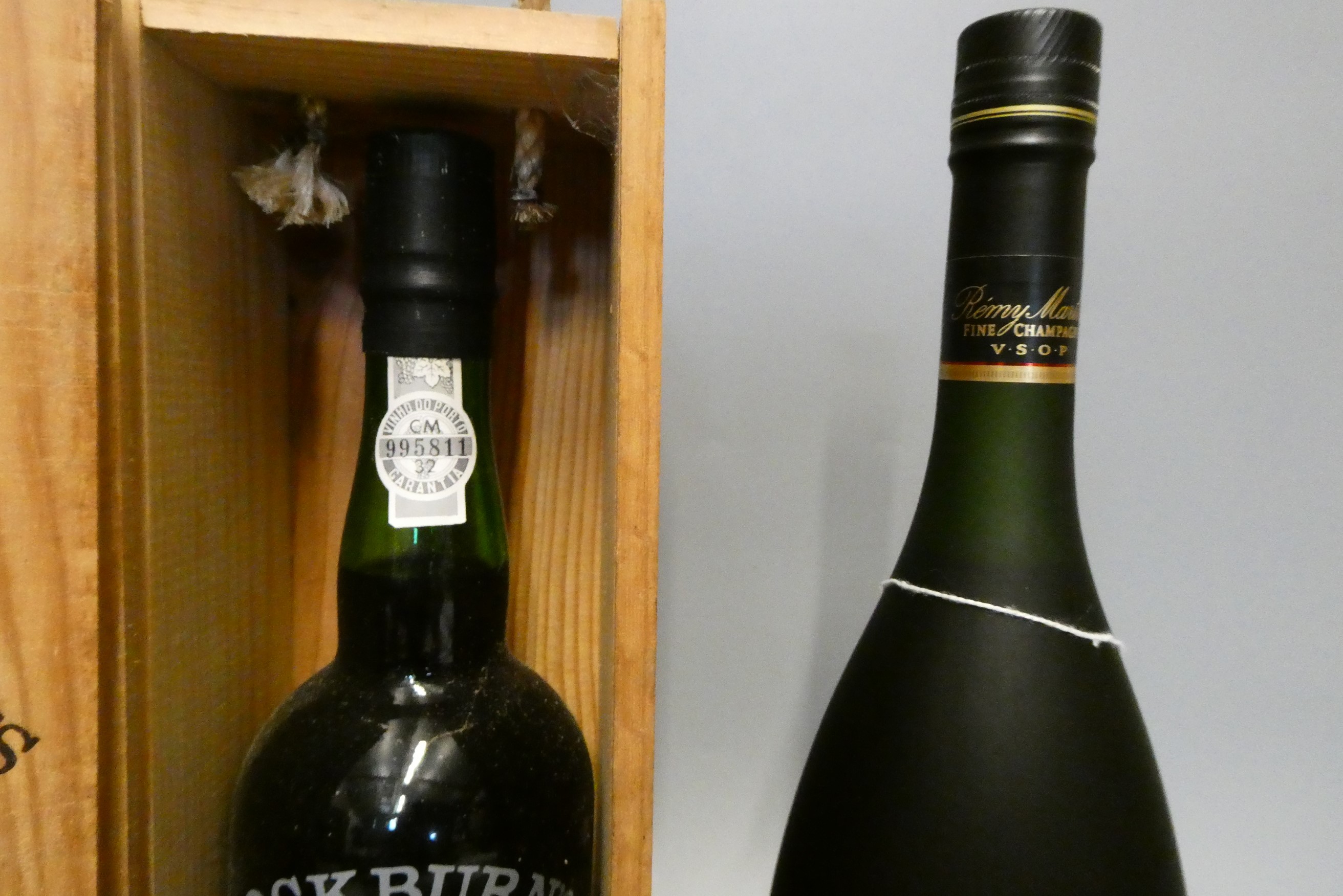 Two bottles comprising a boxed Cockburn's LBV 1984 port, and a 1litre Remy Martin VSOP fine Image