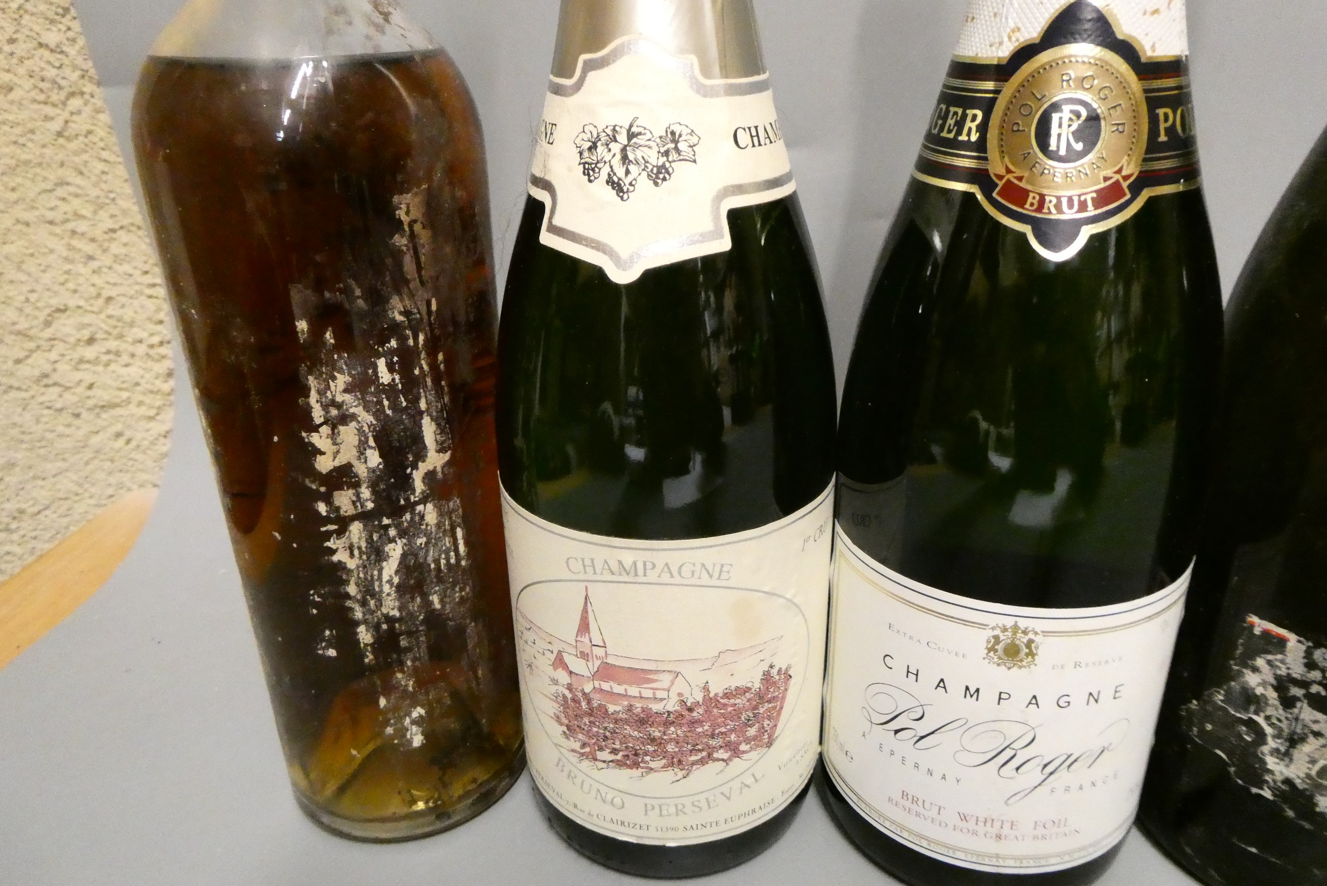 Nine bottles of mainly wine and champagne Image