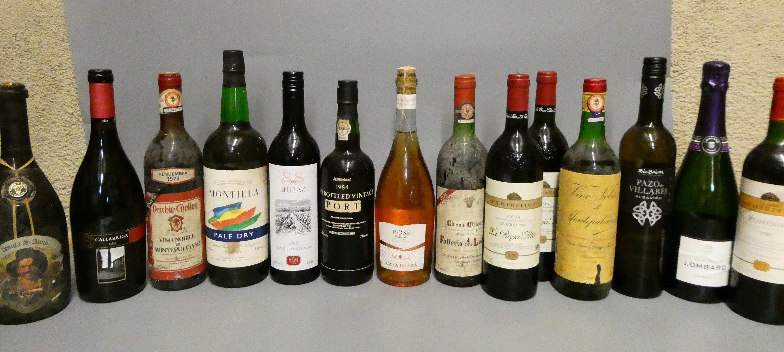 Fourteen bottles of mixed wine Image