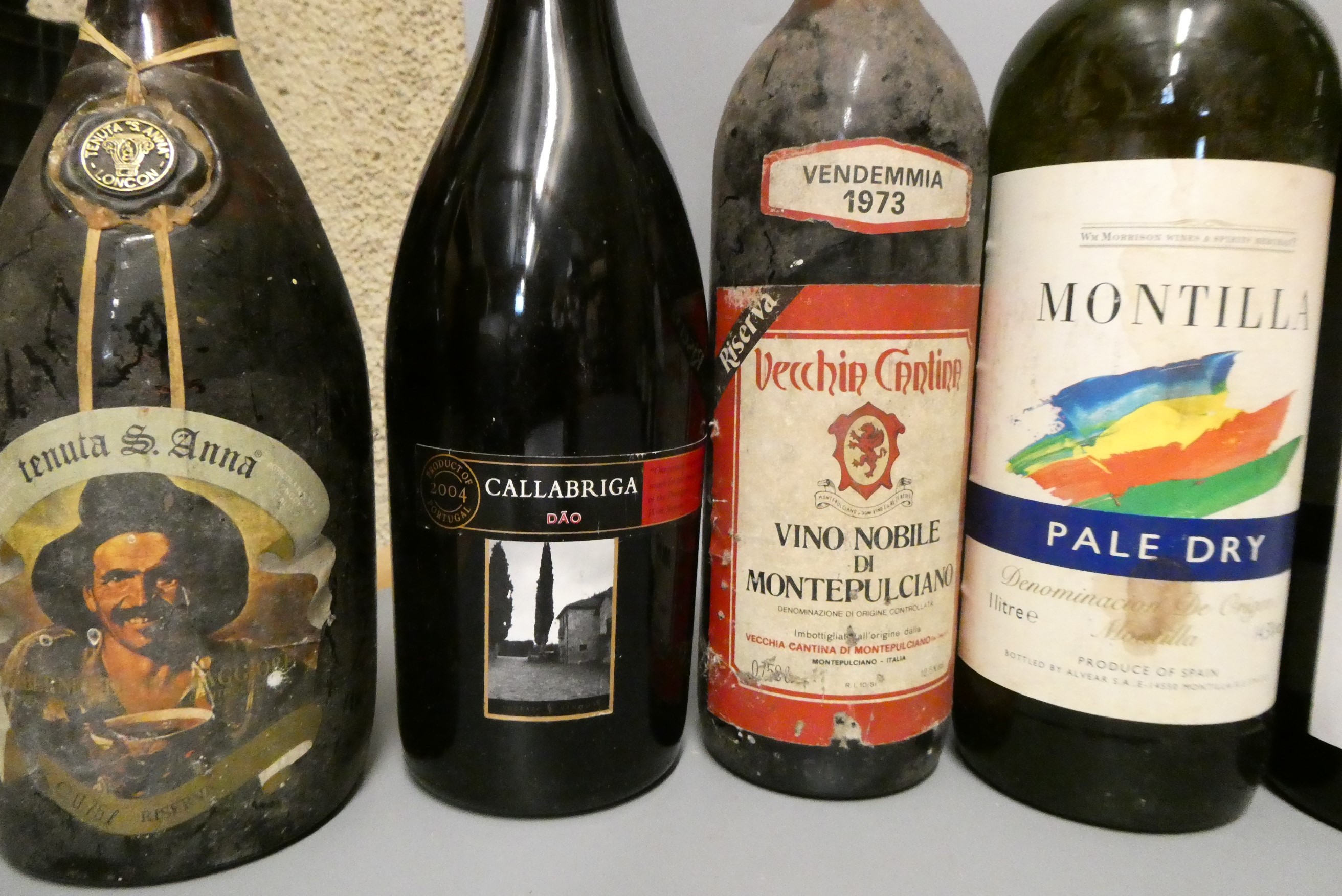 Fourteen bottles of mixed wine Image