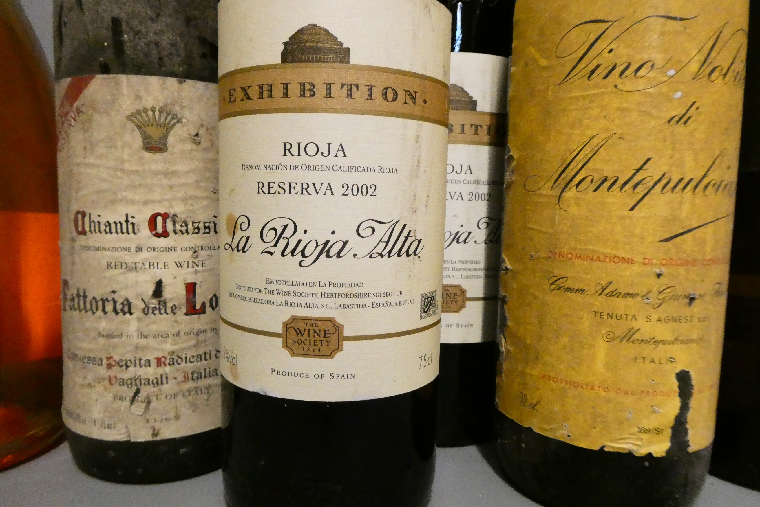Fourteen bottles of mixed wine Image