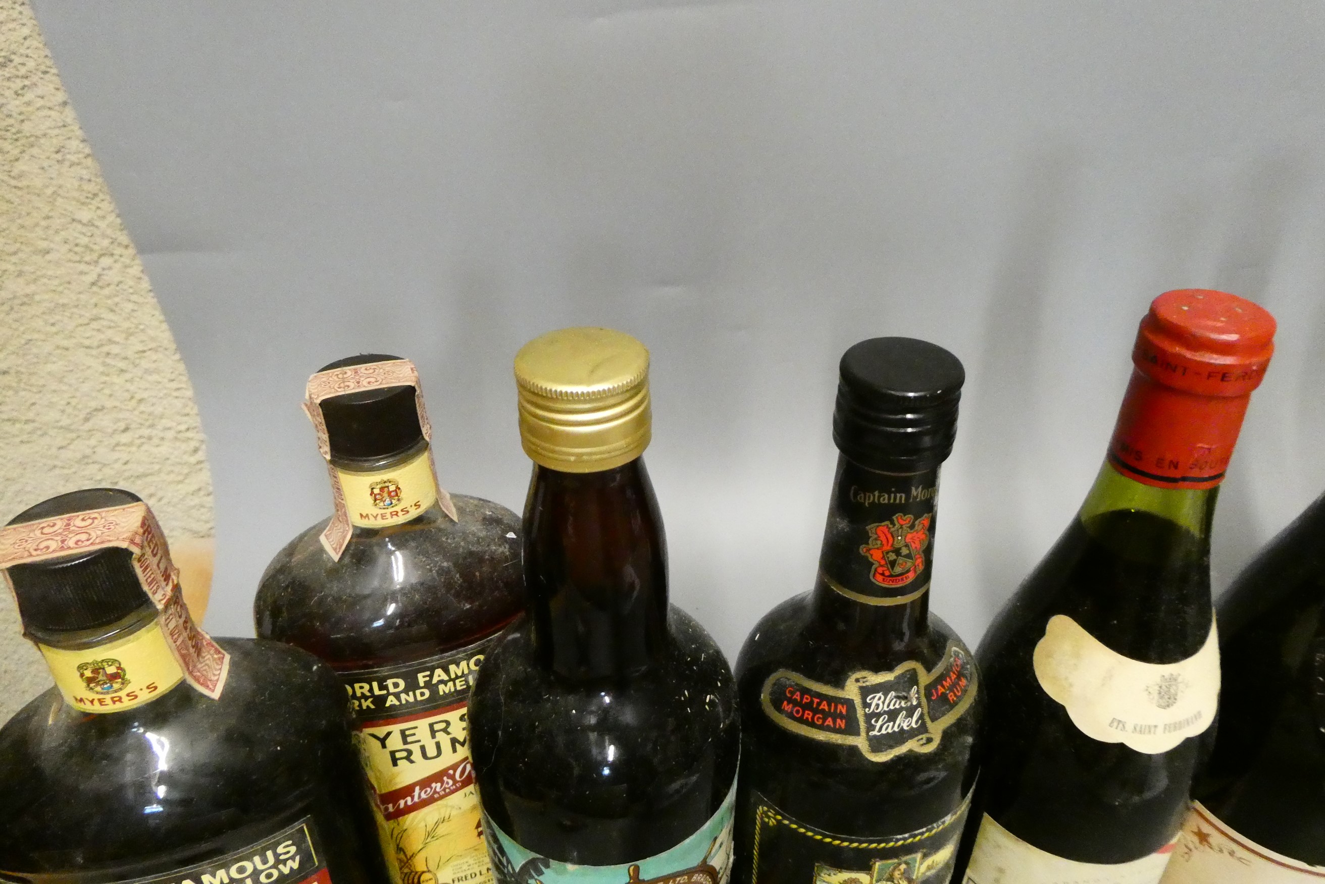 Eleven bottles of mixed alcohol Image