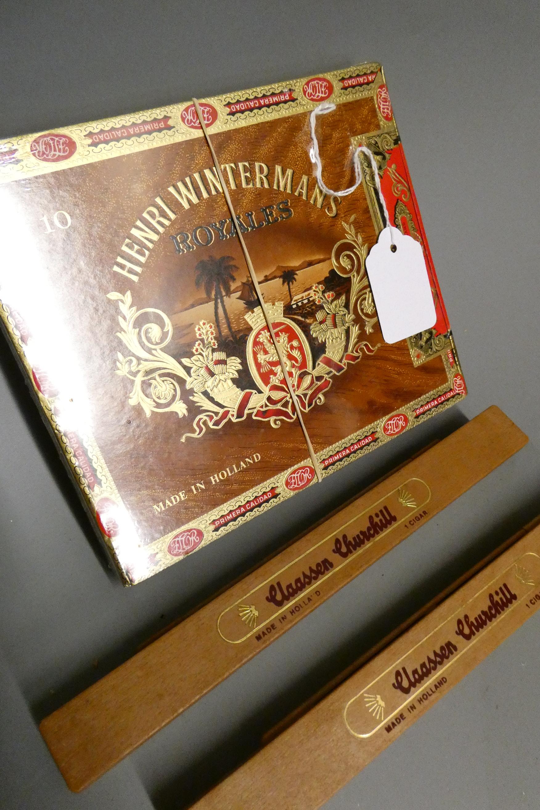10 Henri Wintermans Royals cigars, boxed, together with two Claassen Churchill cigars in containers Image