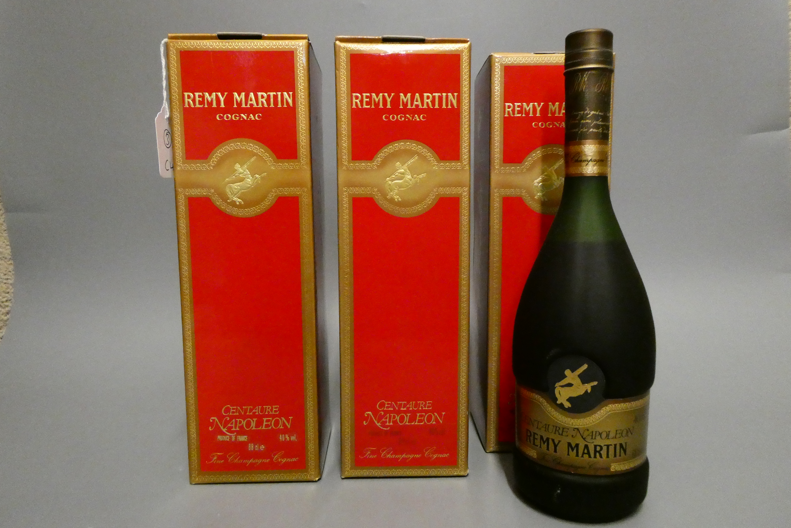 Three bottles Remy Martin Centaure Napoleon cognac, 68cl, 40%, boxed (Est. plus 24% premium inc. Image