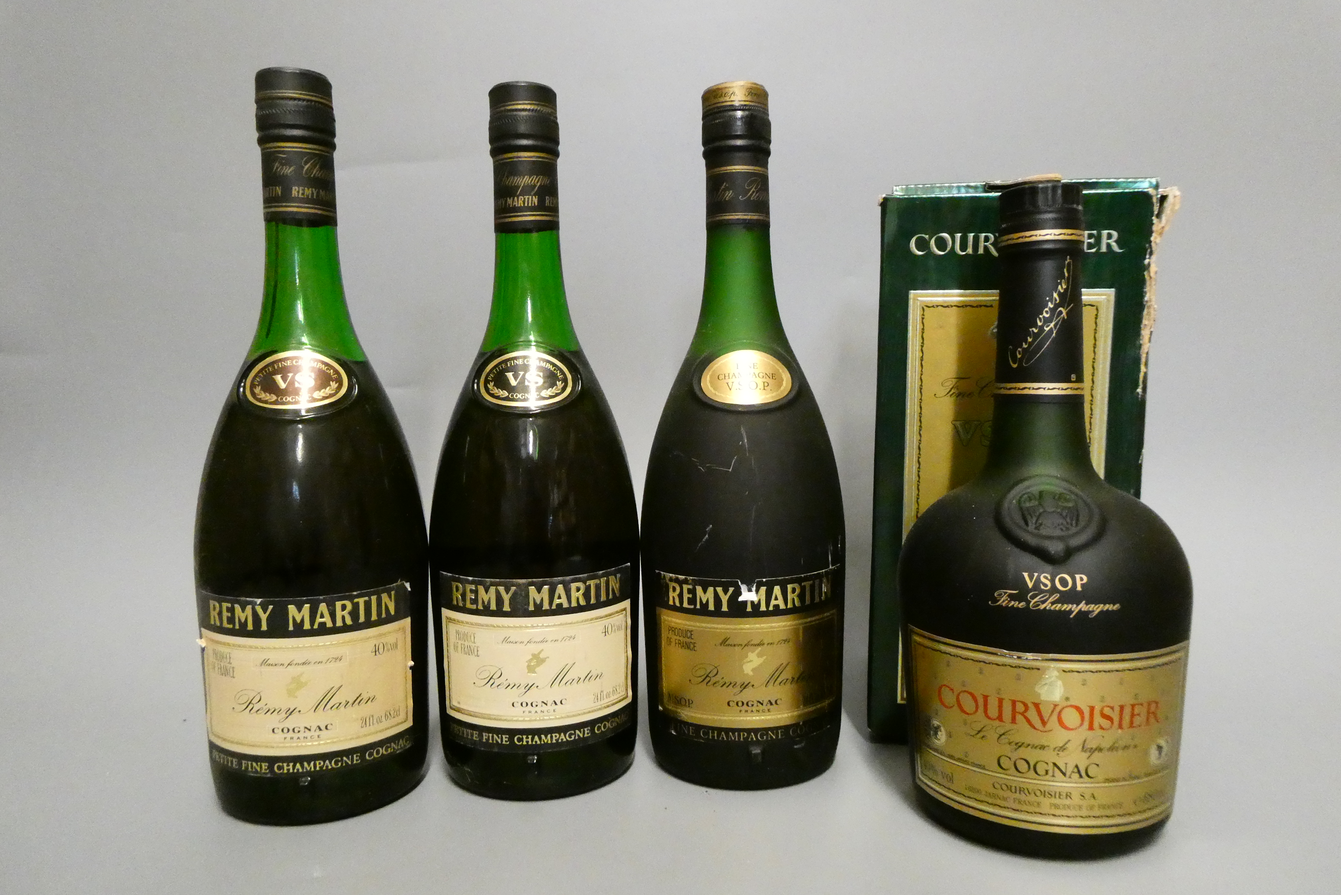 Four bottles of cognac, comprising two Remy Martin VS, one Remy Martin VSOP Fine Champagne cognac, Image