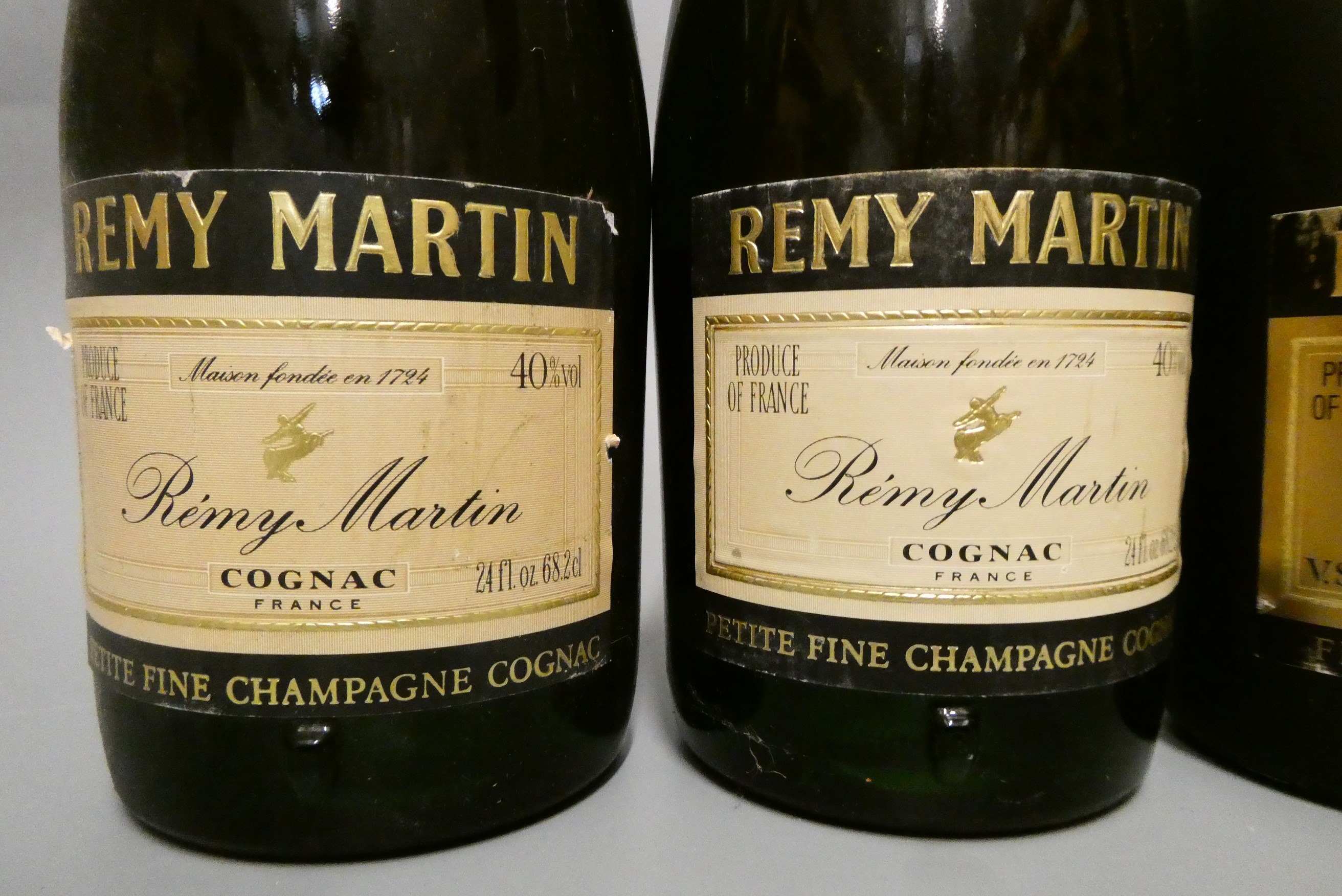 Four bottles of cognac, comprising two Remy Martin VS, one Remy Martin VSOP Fine Champagne cognac, Image