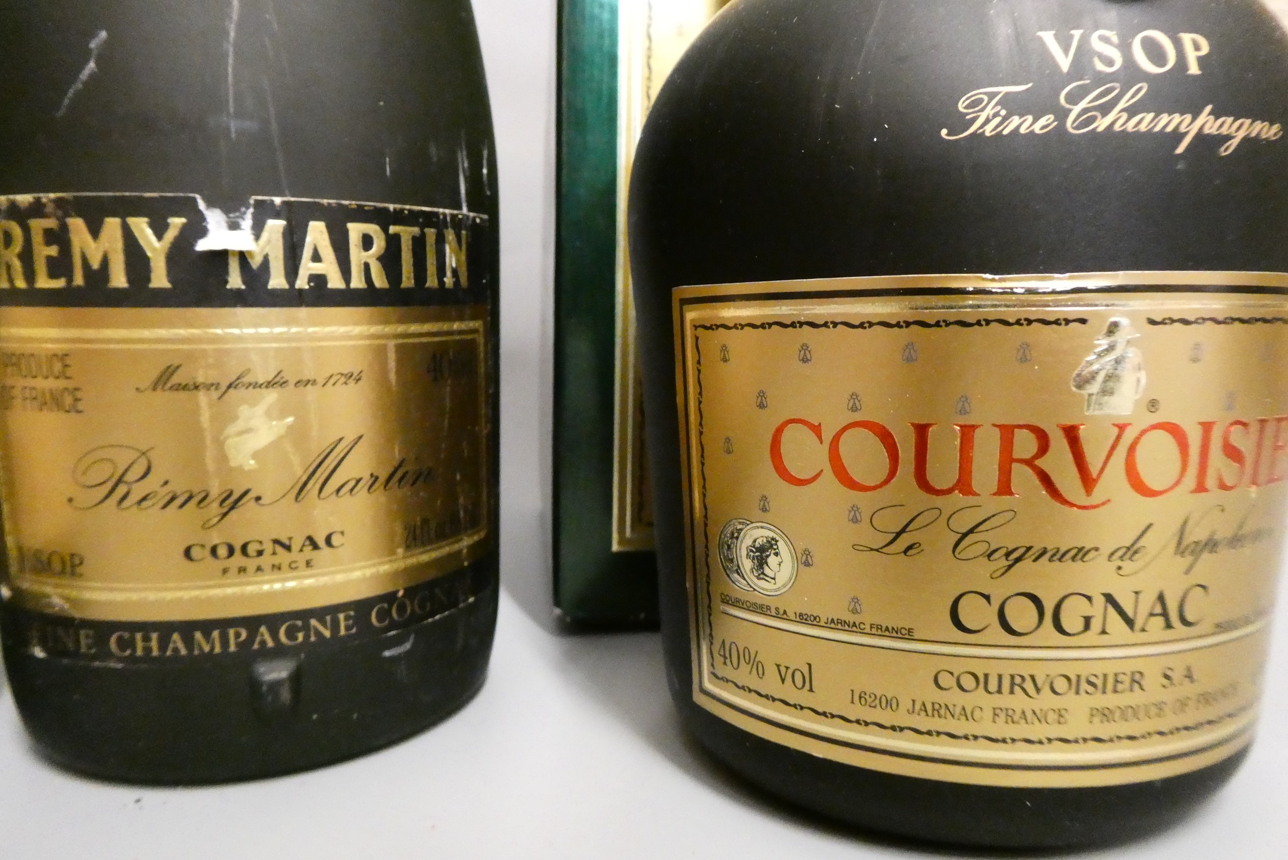 Four bottles of cognac, comprising two Remy Martin VS, one Remy Martin VSOP Fine Champagne cognac, Image