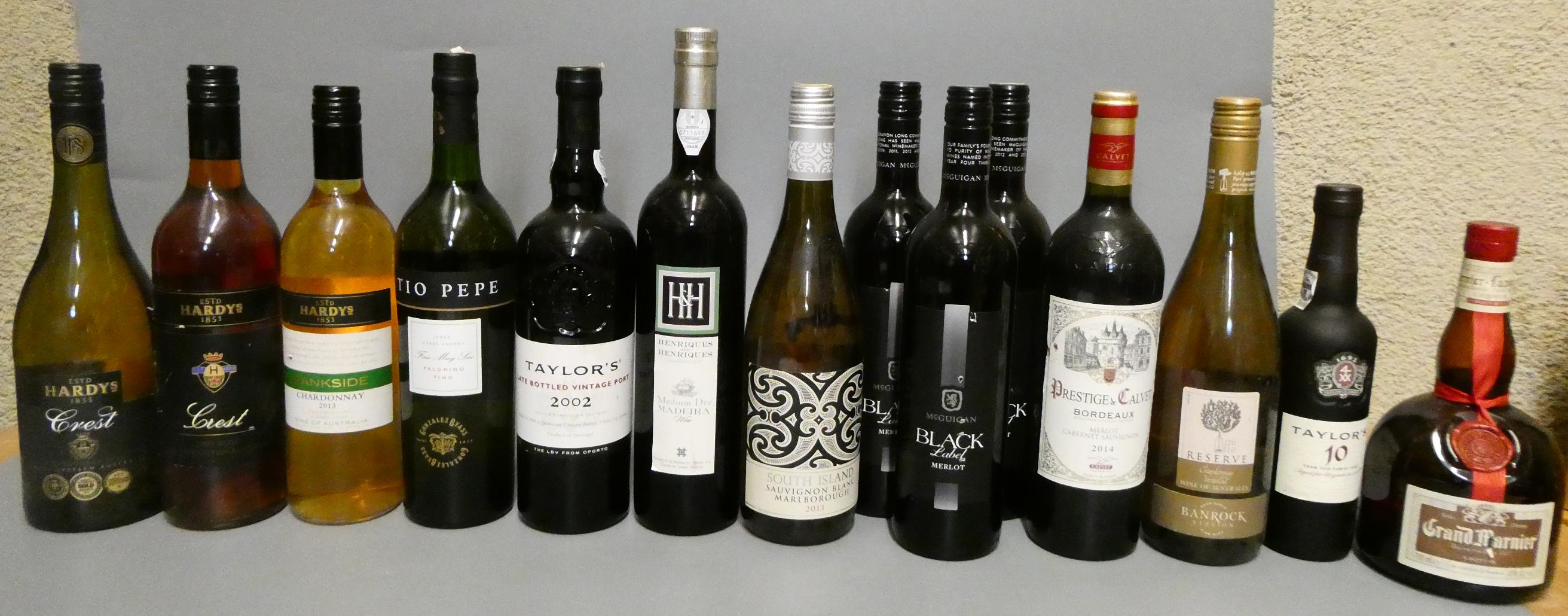 Thirteen bottles & one half bottle of mixed alcohol Image