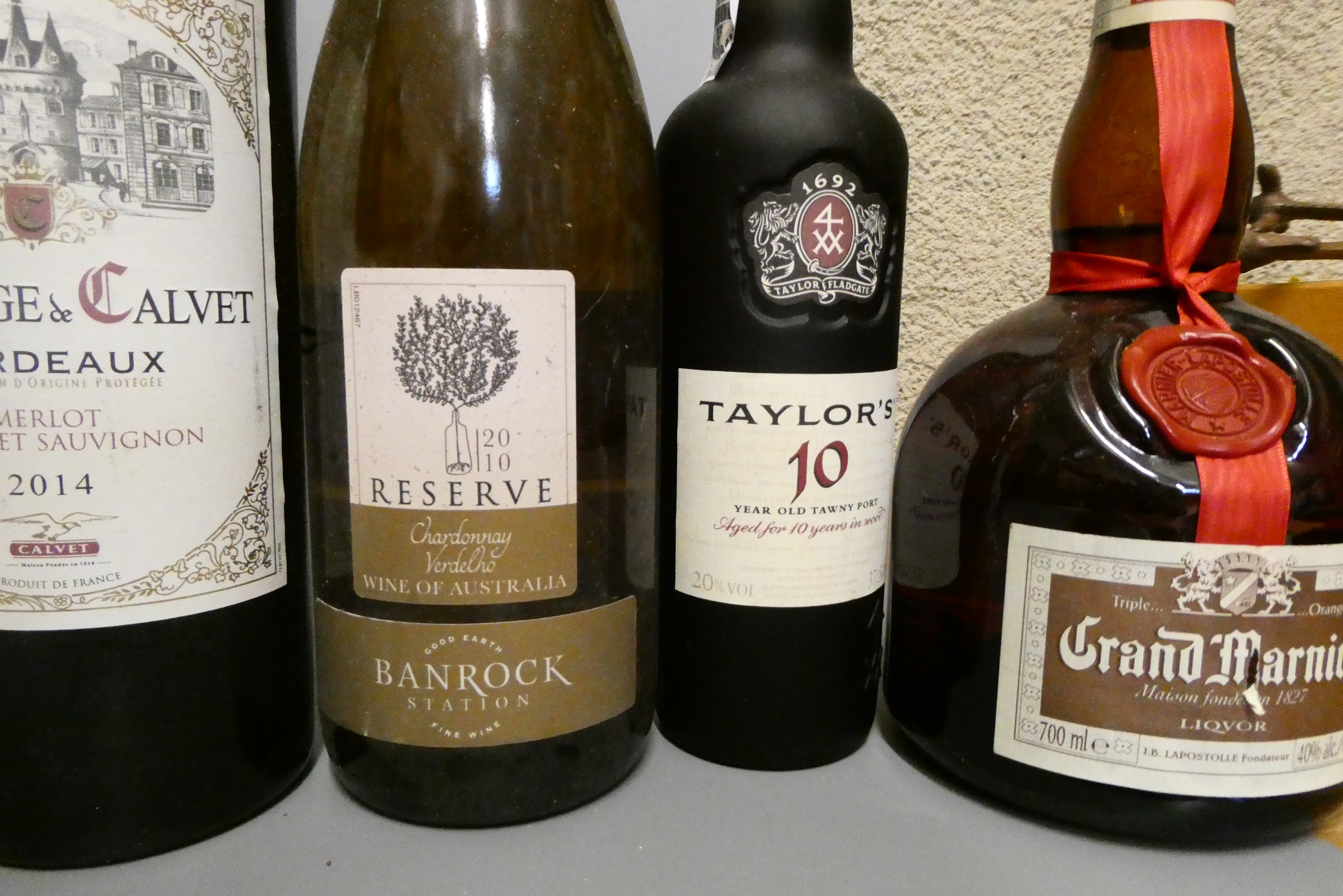 Thirteen bottles & one half bottle of mixed alcohol Image