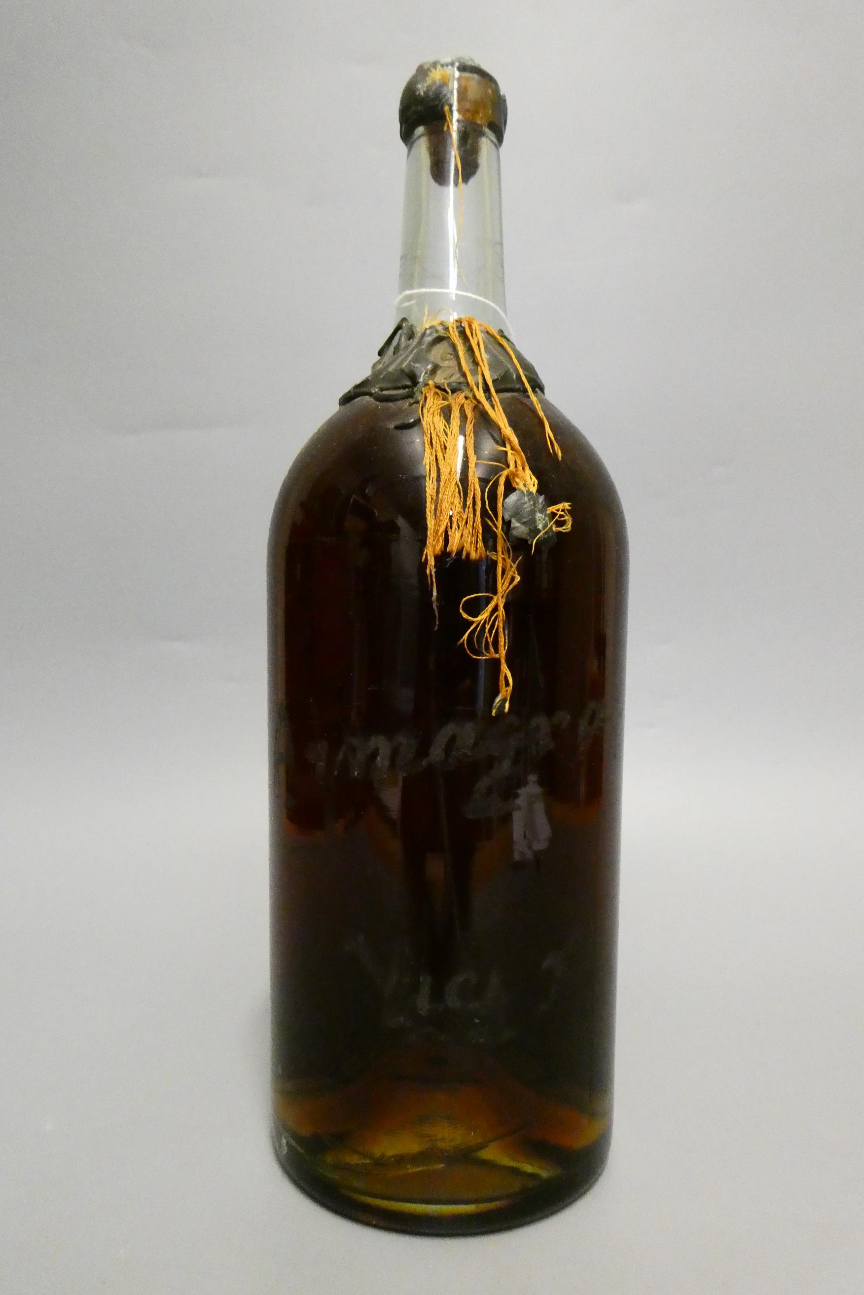 A large vintage Armagnac, with wax impressed "G" and bottle inscribed "Armagnac Vici (?)", bottle Image