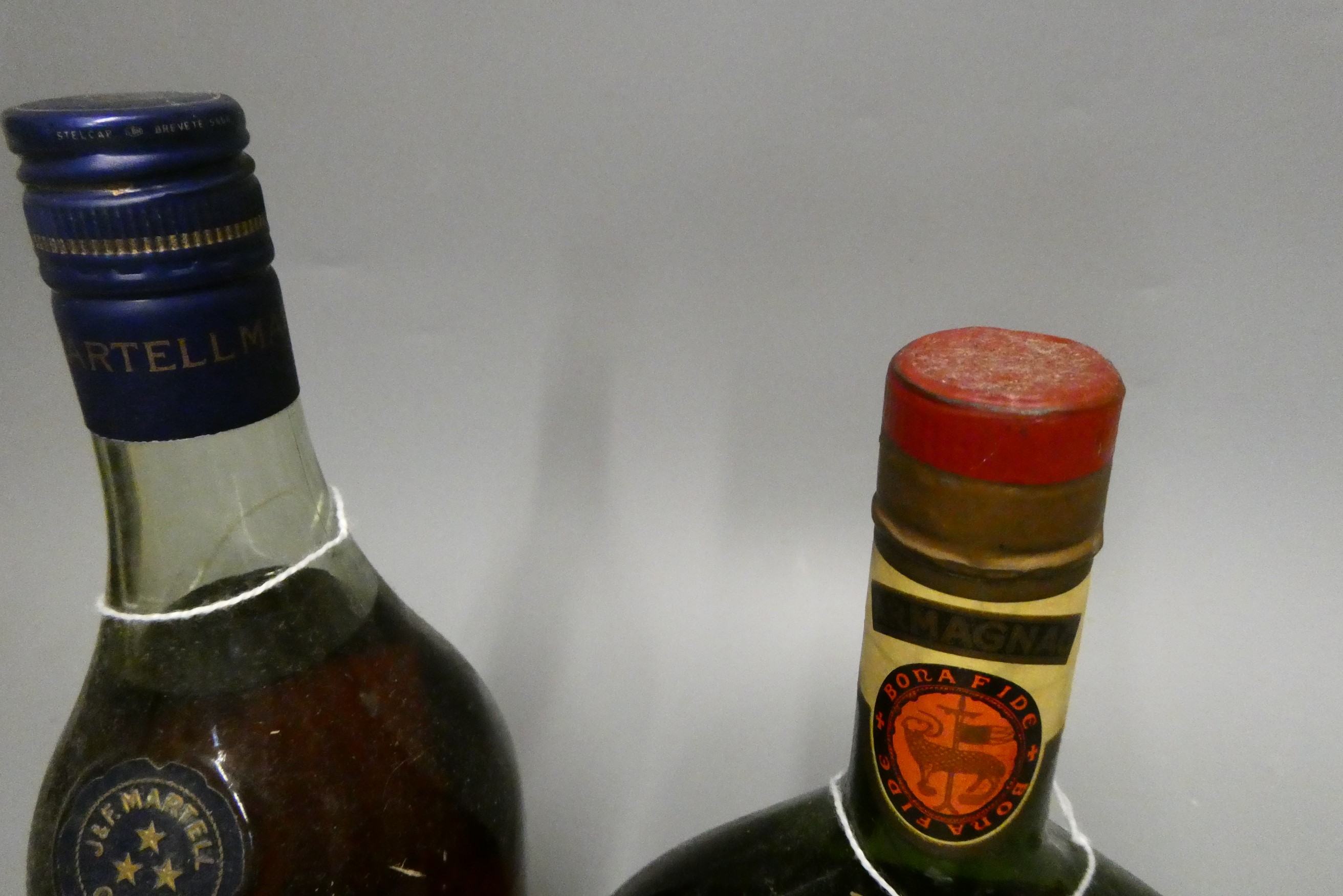 Malliac Grand Armagnac, and a Martell Three Star cognac, both 24 fl. oz. and 70° proof (2) (Est. Image
