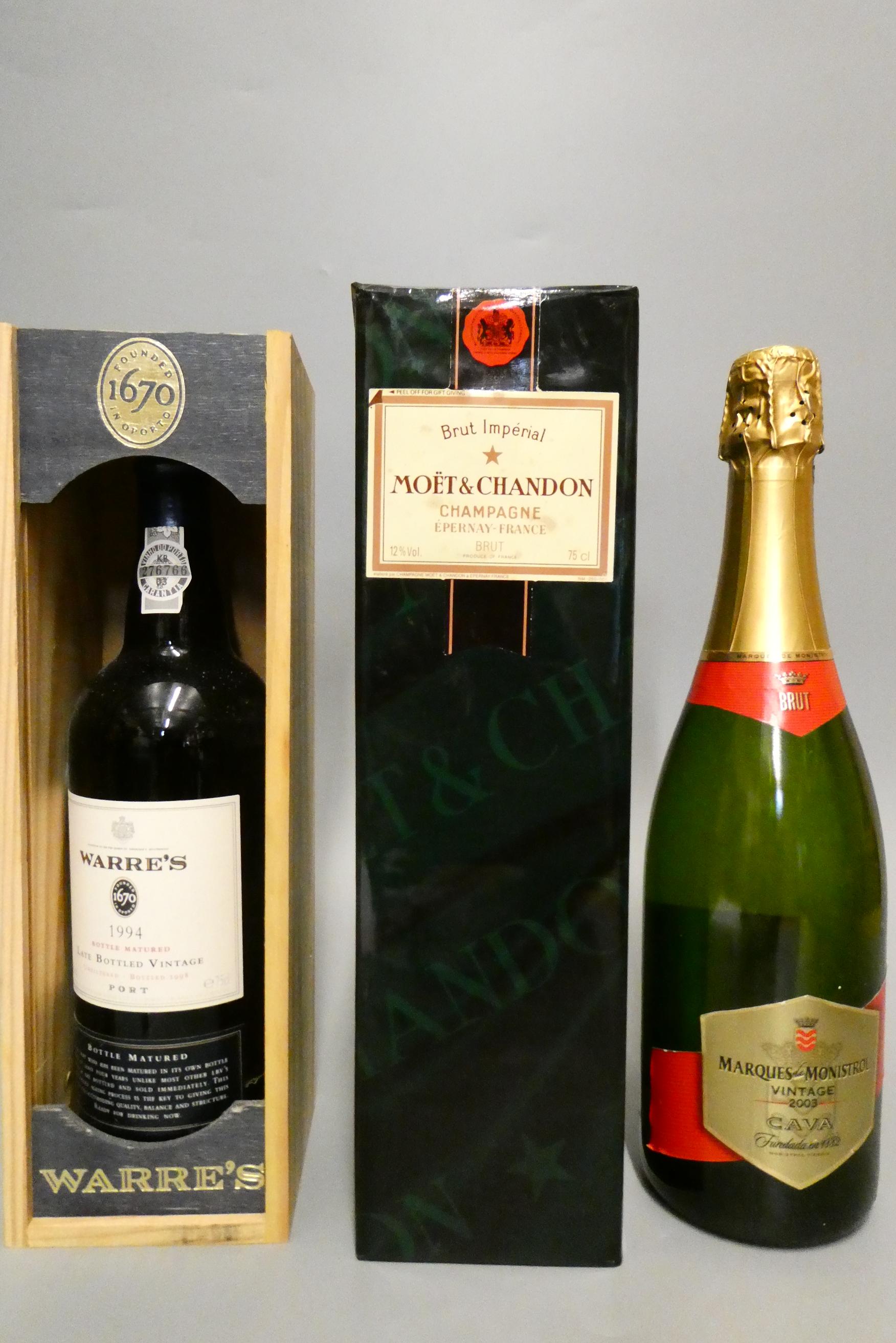 Three mixed bottles, comprising a boxed bottle of Warre's LBV 1994 port, a boxed Moet & Chandon brut Image