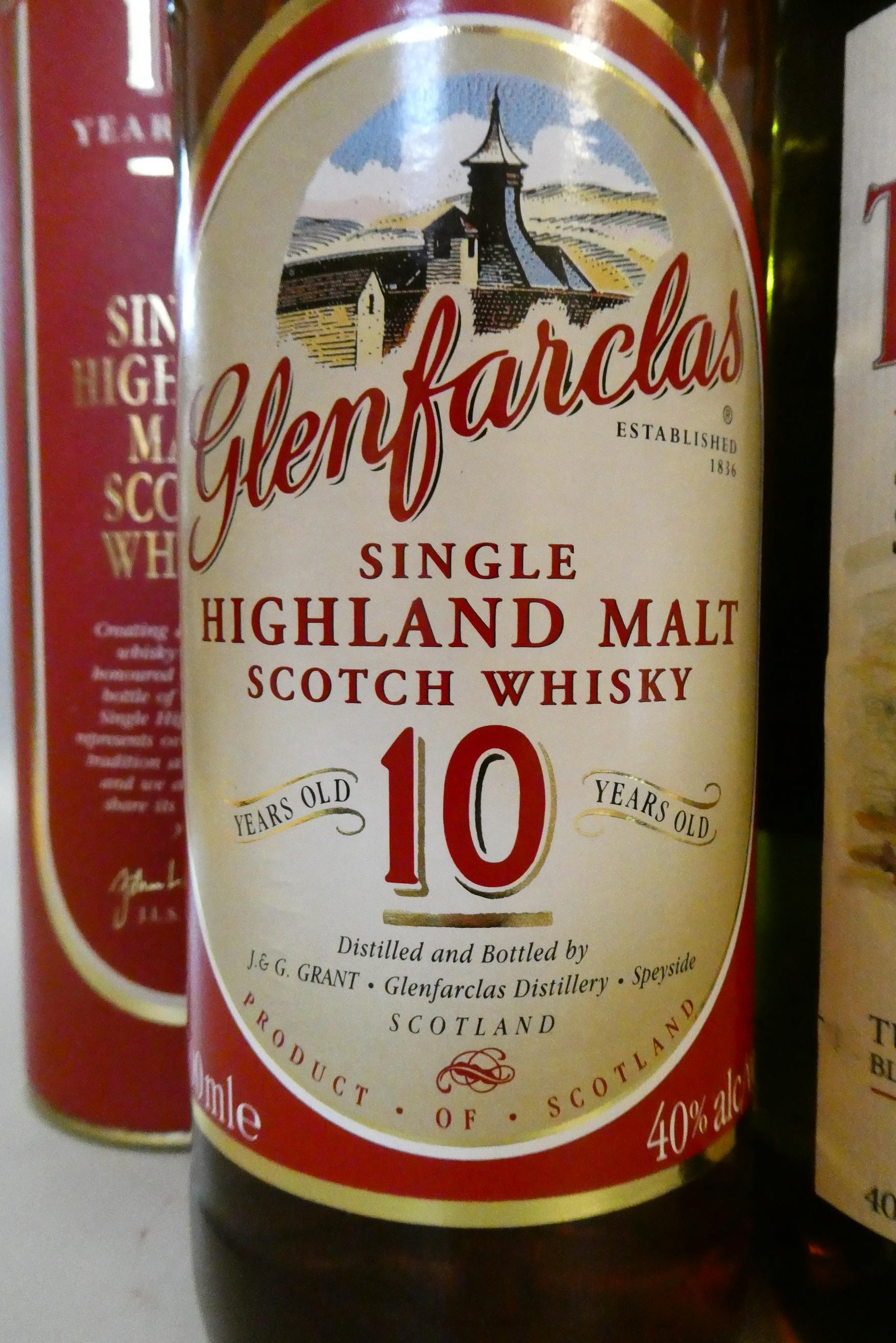 Two bottles 10yr old Single Highland malt whisky, comprising Glenfarclas, 700ml, 40%, and Image