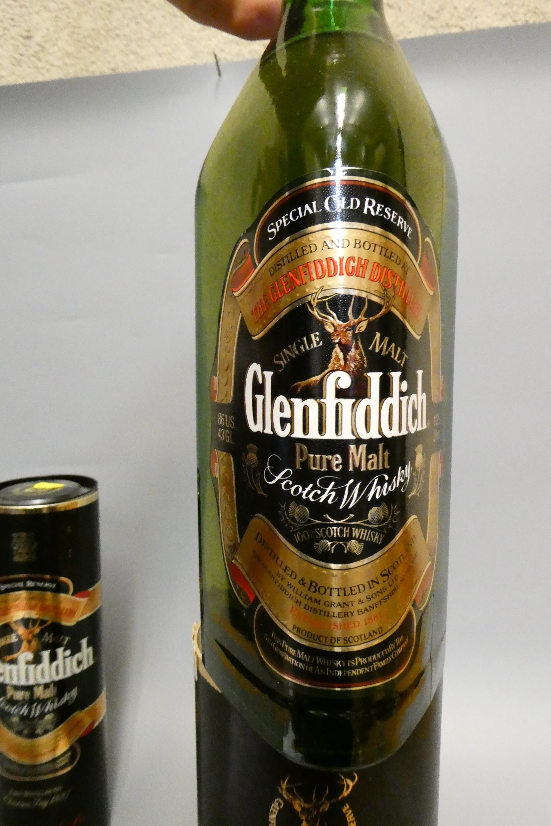 Eight bottles of mixed spirits Image