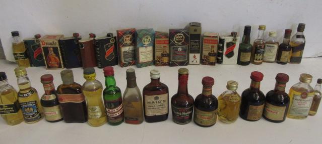 Thirty three miniatures of 70° proof Malt and other whisky Image
