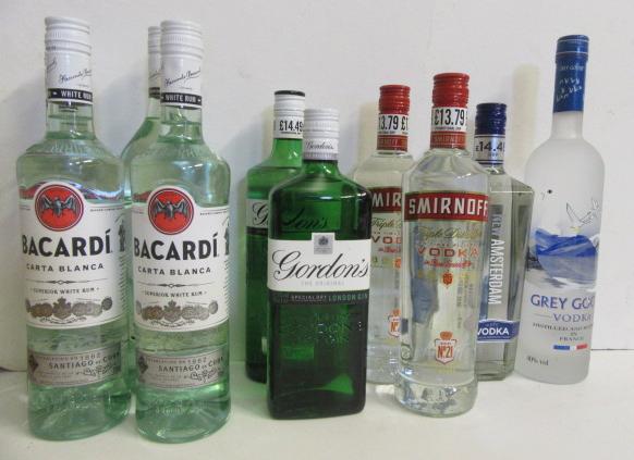 One litre and three bottles Bacardi Rum Image