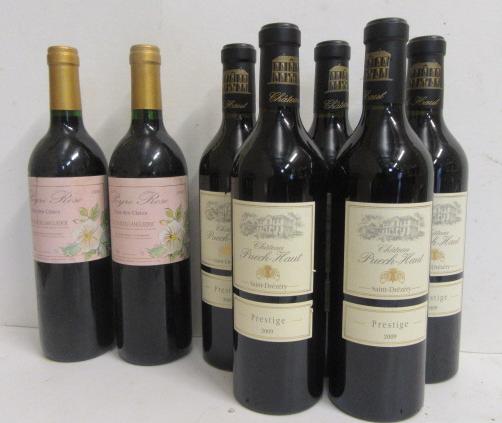 Five bottles 2009 Chateau Puech-Haut Saint Drezery Image