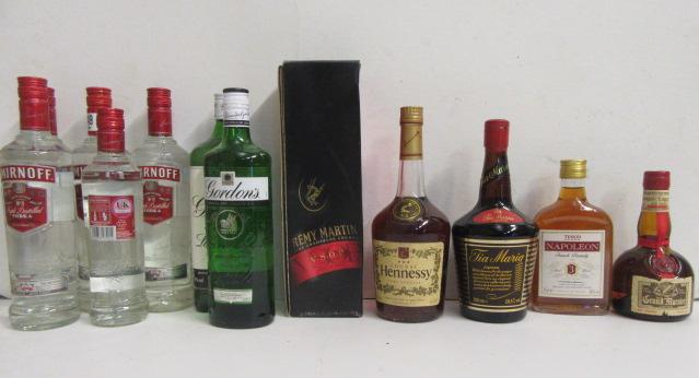 Five bottles and one half bottle Smirnoff Vodka Image