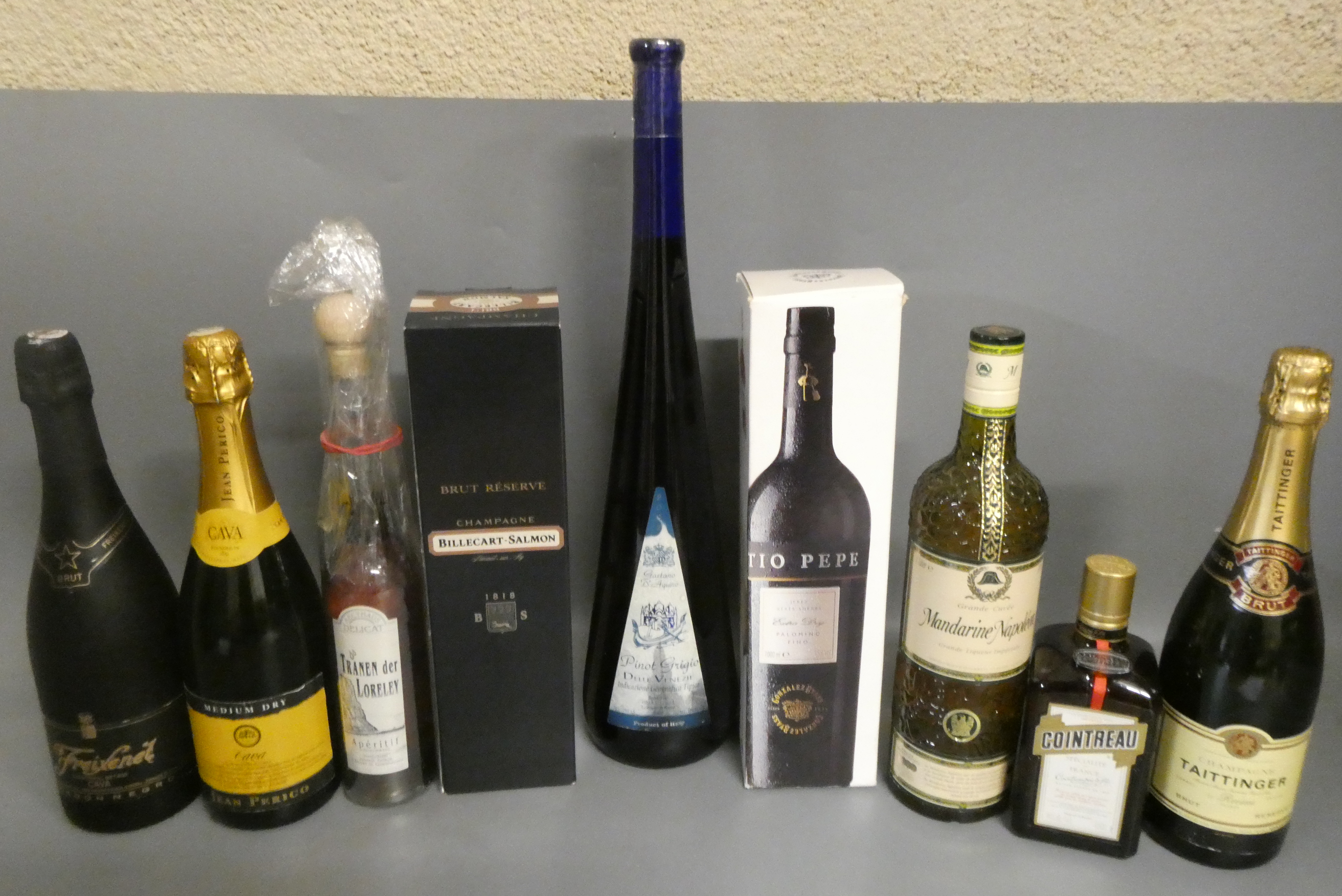 Nine bottles of champagne and mixed alcohol Image