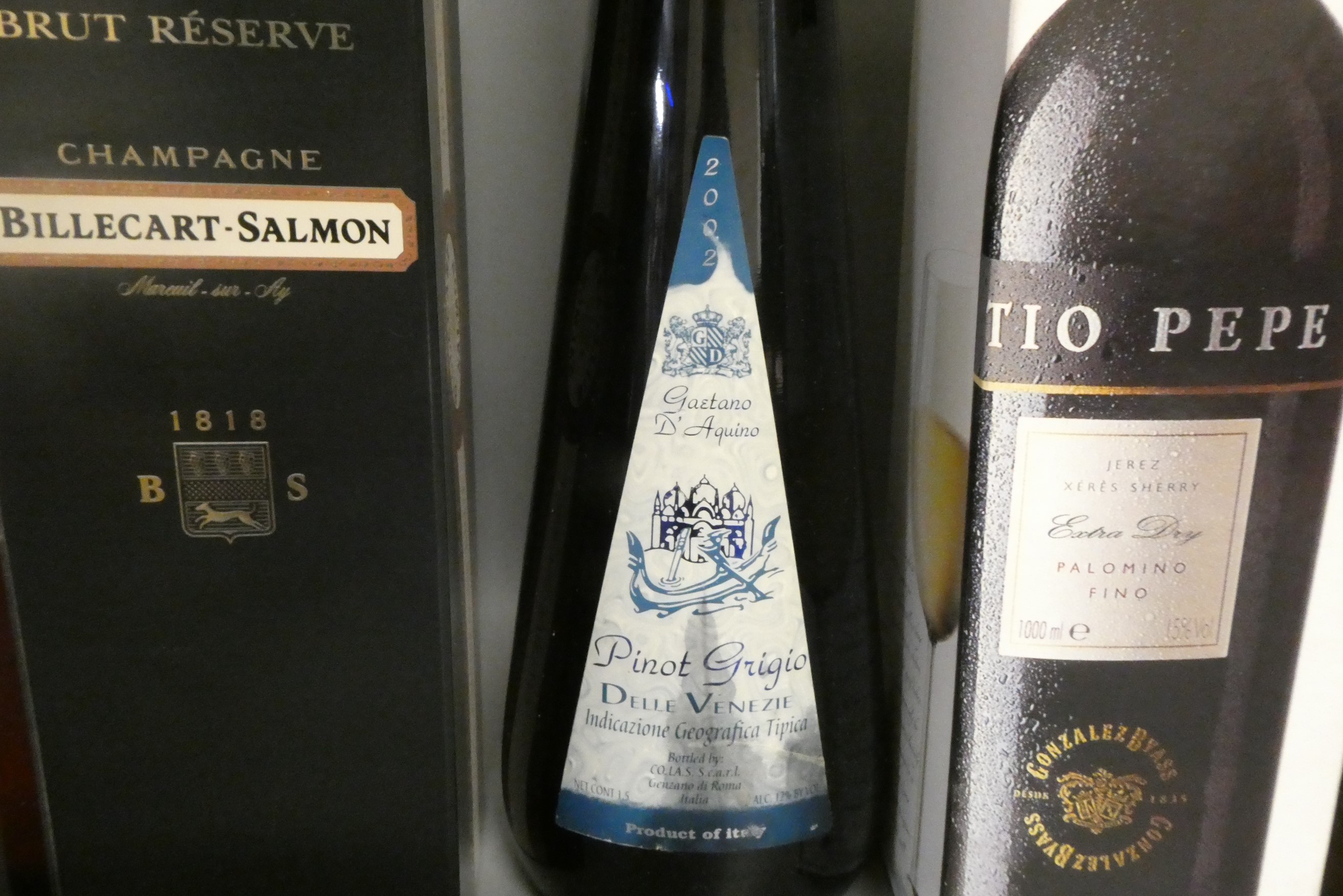 Nine bottles of champagne and mixed alcohol Image