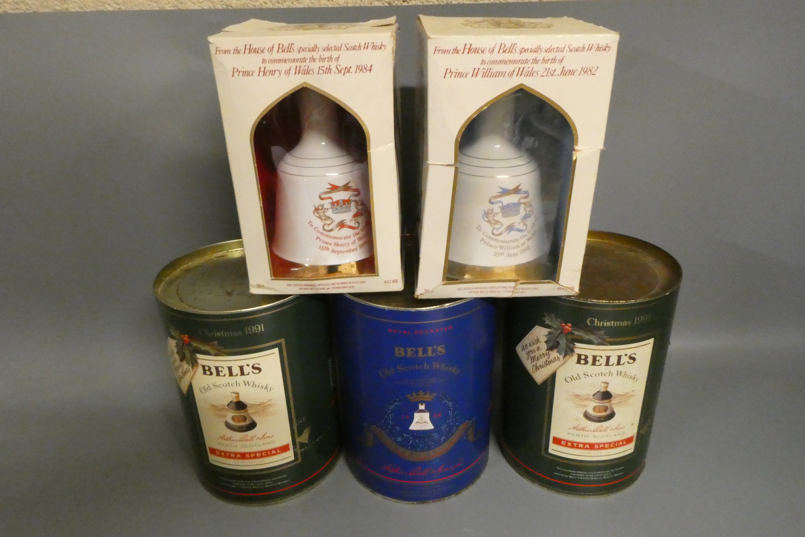 Five boxed Bell's whisky decanters Image