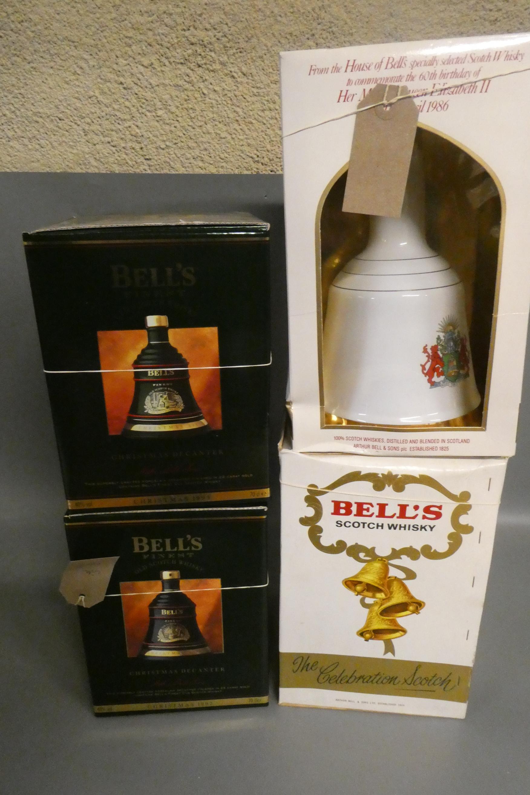 Four boxed Bell's whisky decanters Image