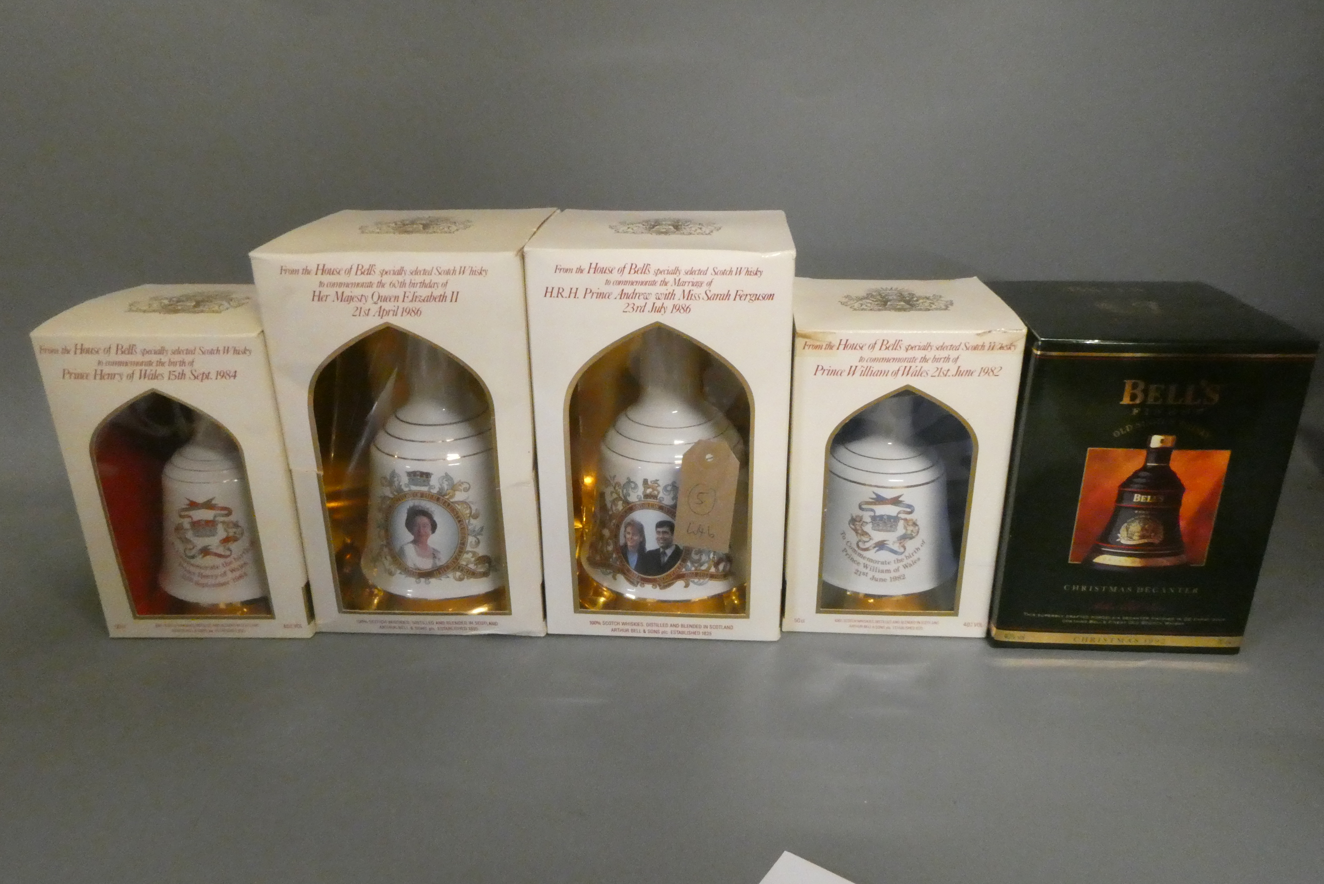 Five boxed Bell's whisky decanters Image