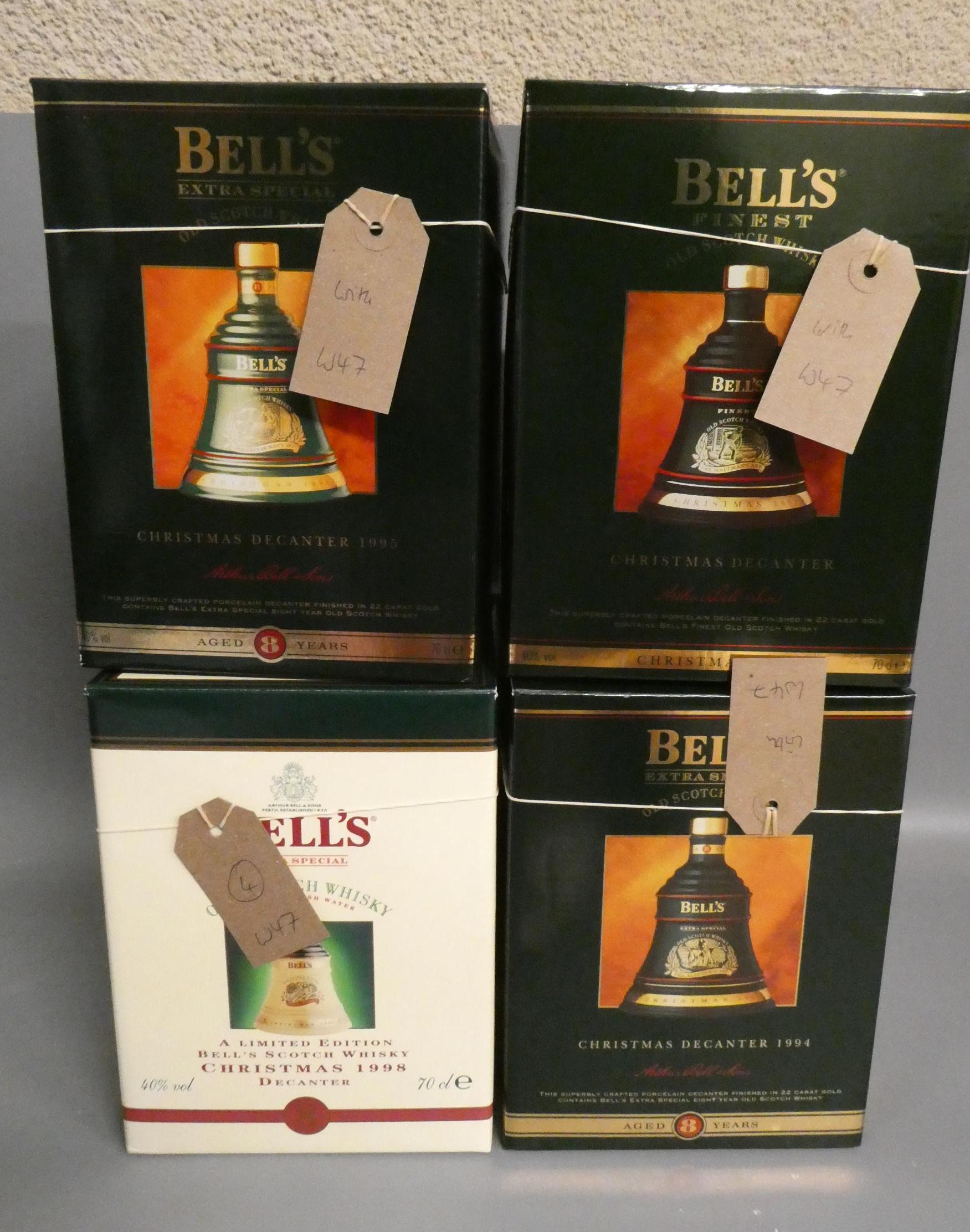 Four 70cl boxed Bell's whisky decanters, comprisng three 8yr old decanters for Christmas 1998, 1995 Image