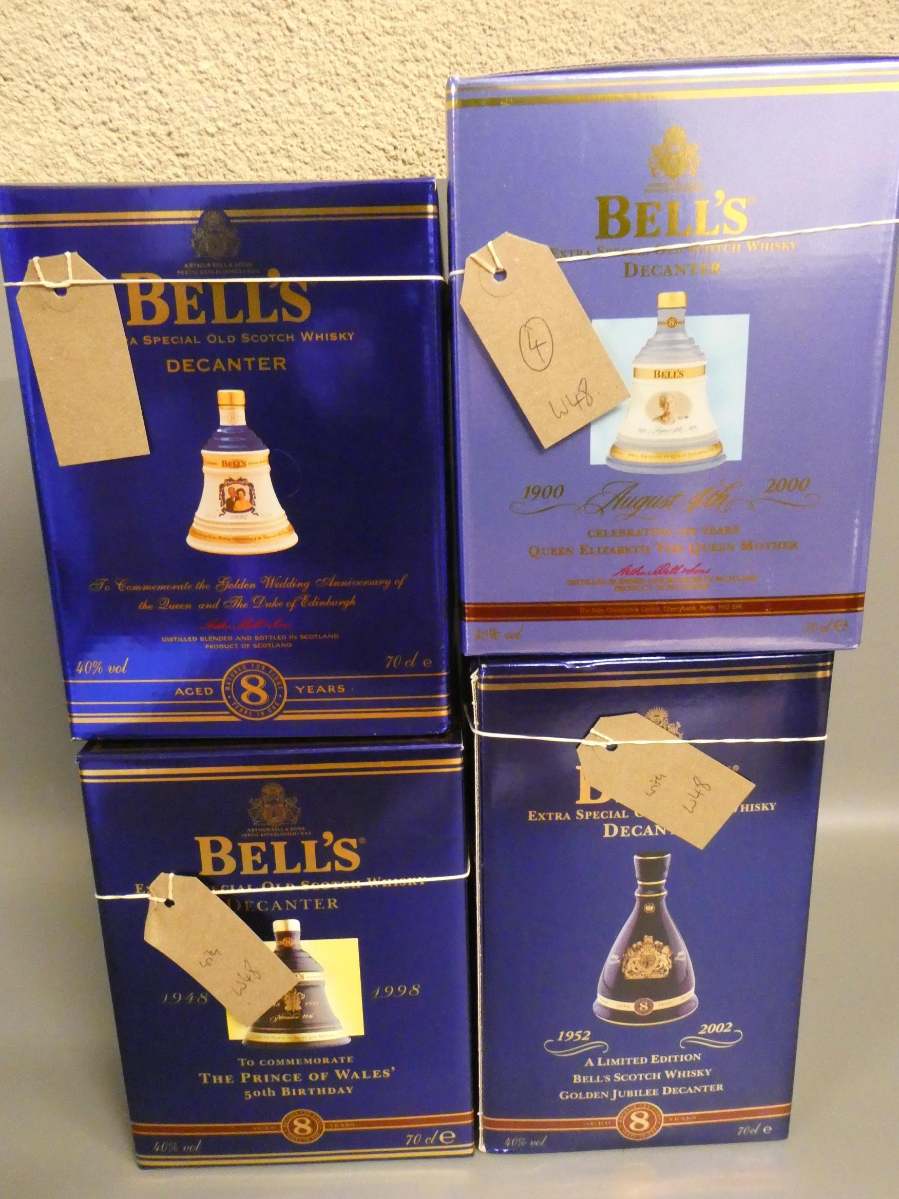 Four 70cl Bell's 8yr old whisky decanters Image