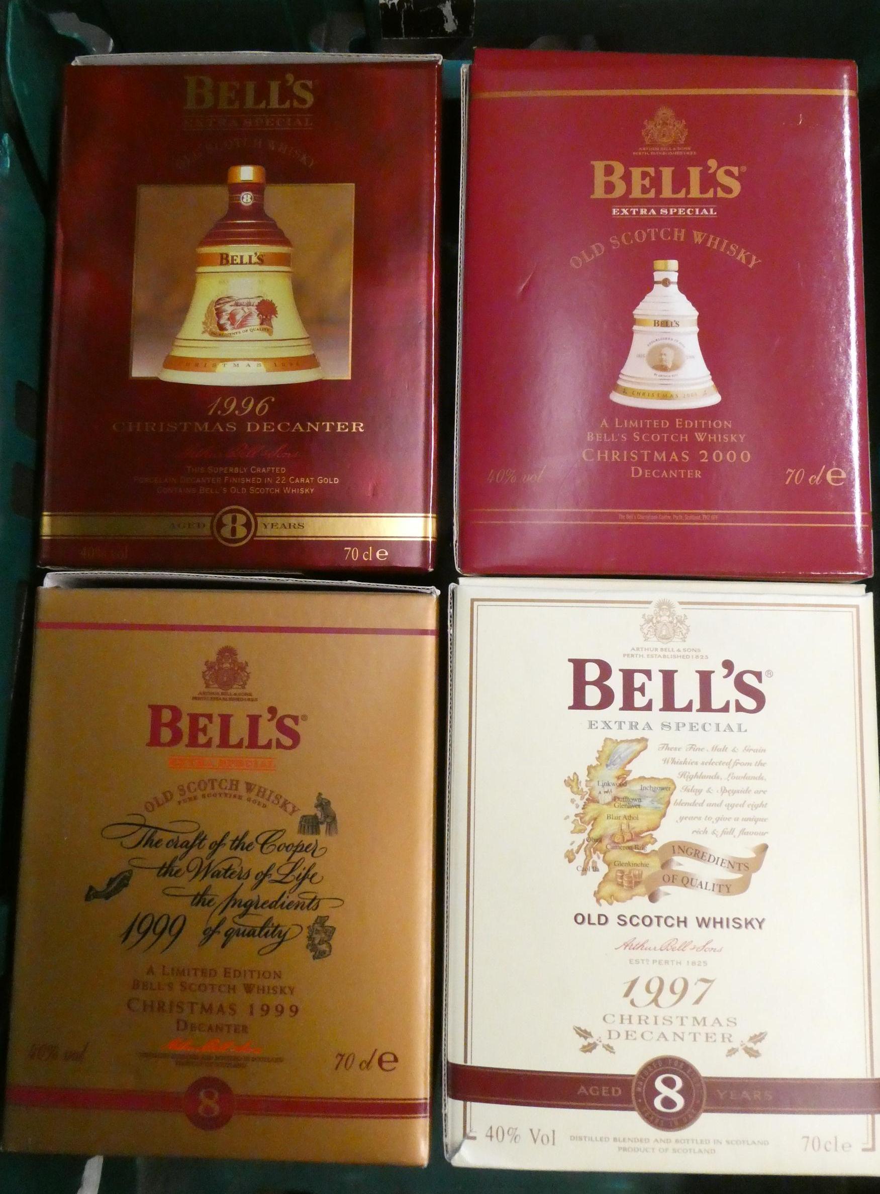 Four 70cl Bell's 8yr old Christmas whisky decanters, comprising 1996, 1997, 1999 and 2000 (Est. plus Image
