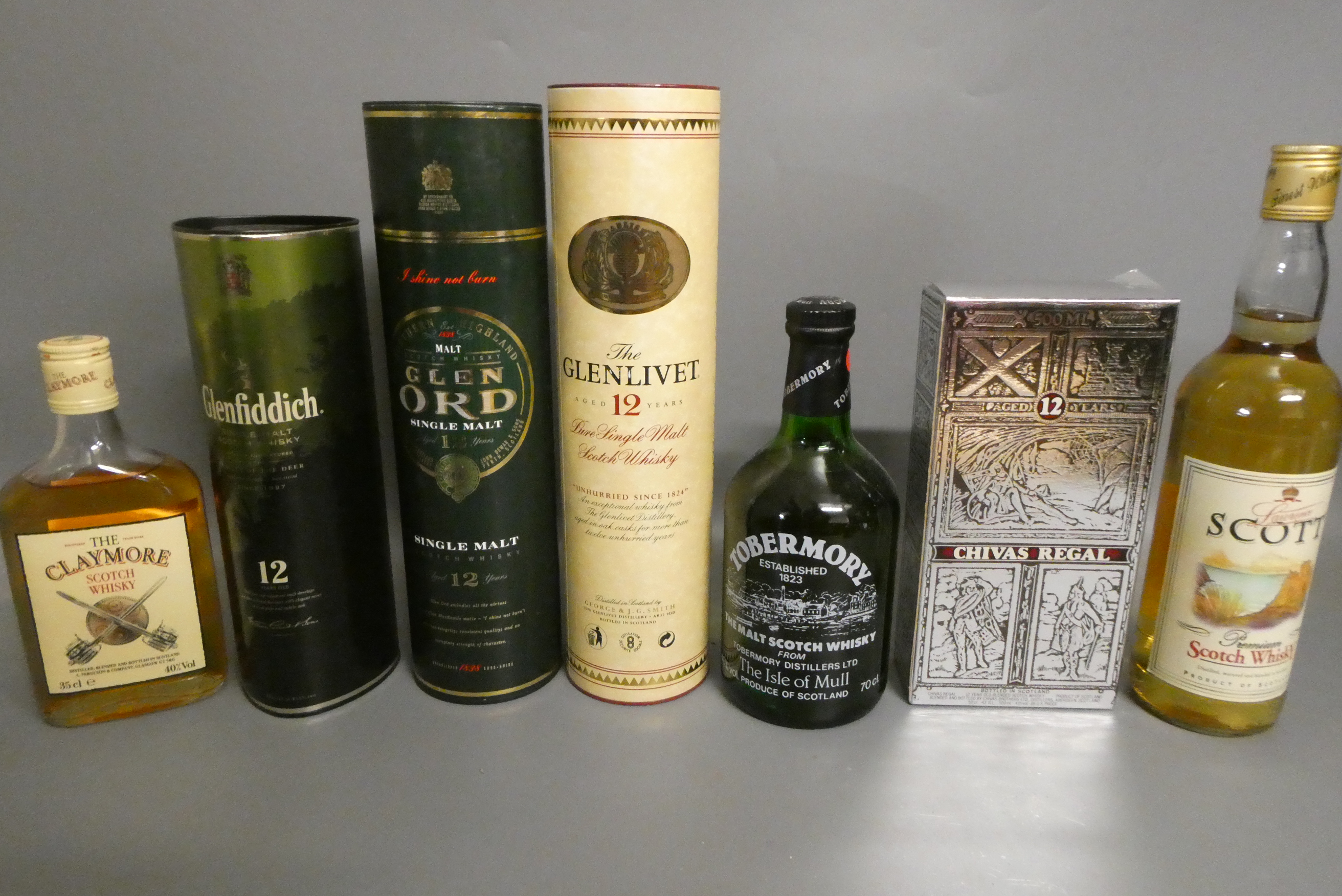 Seven bottles of Scotch whisky Image