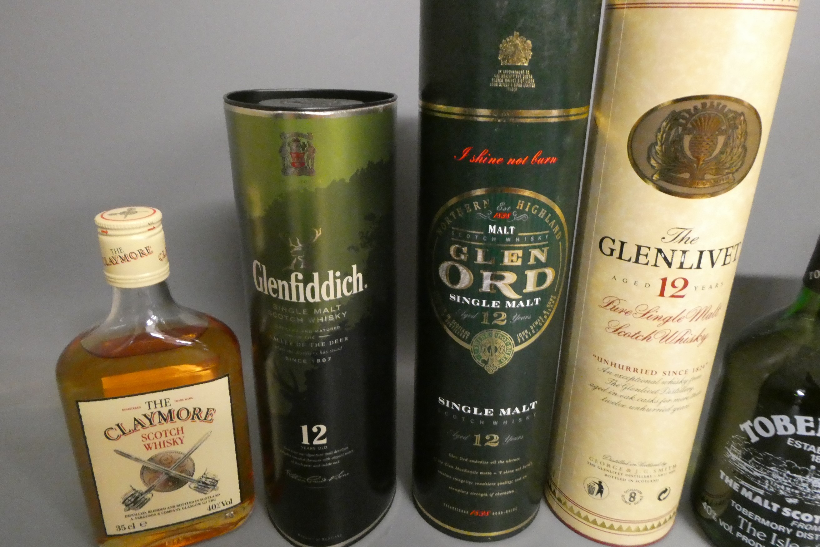 Seven bottles of Scotch whisky Image