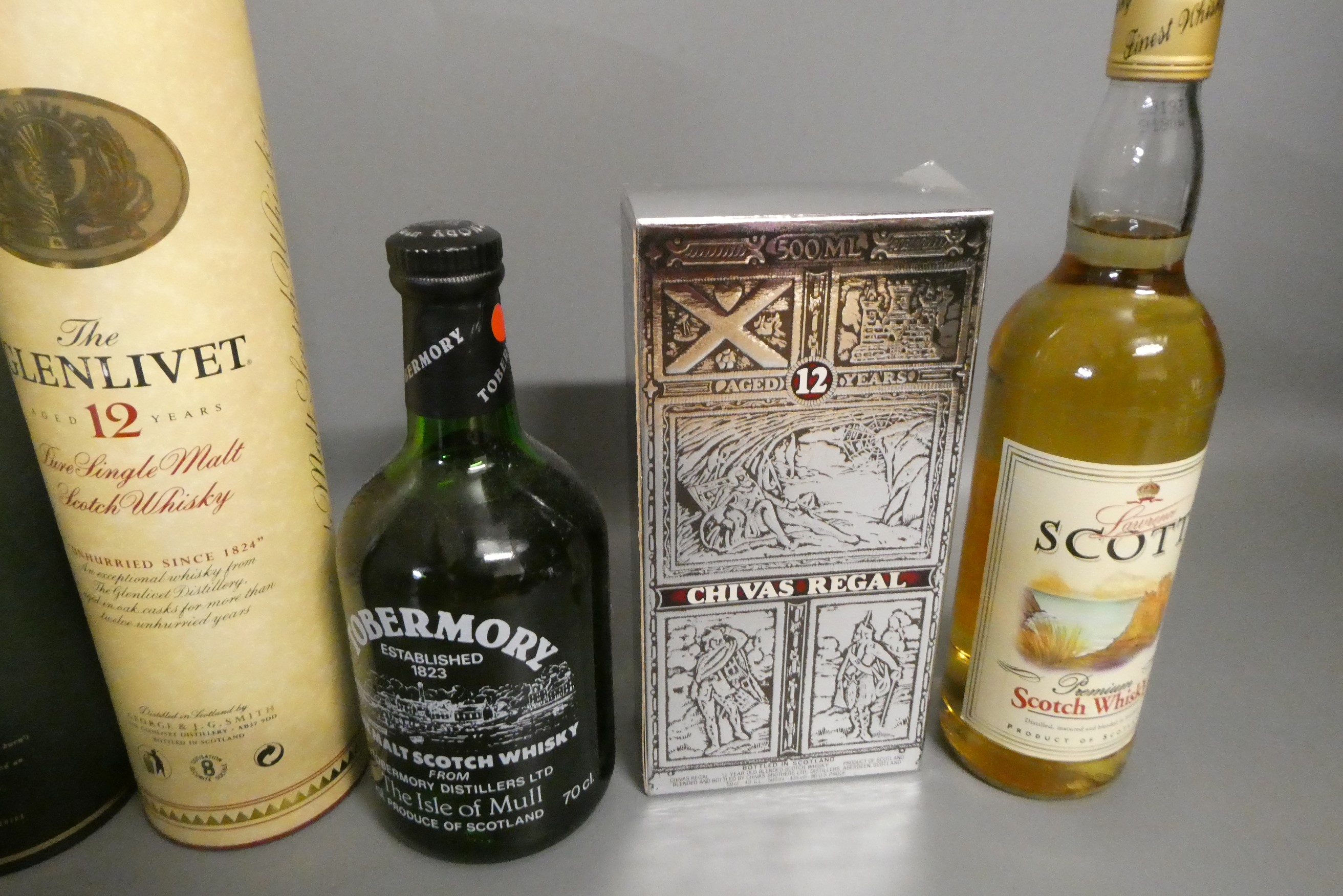 Seven bottles of Scotch whisky Image