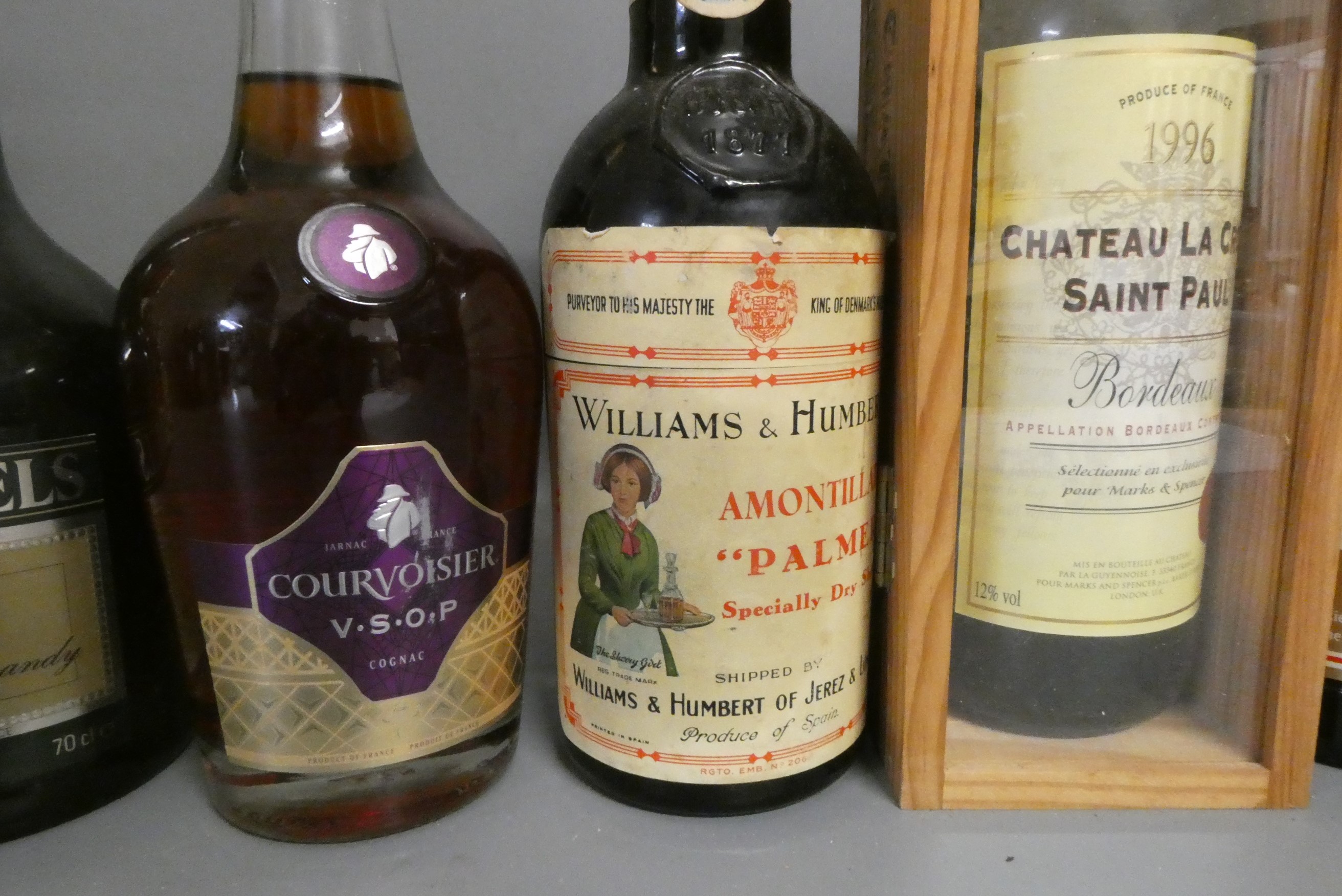 Twelve bottles of mixed alcohol and cognac Image