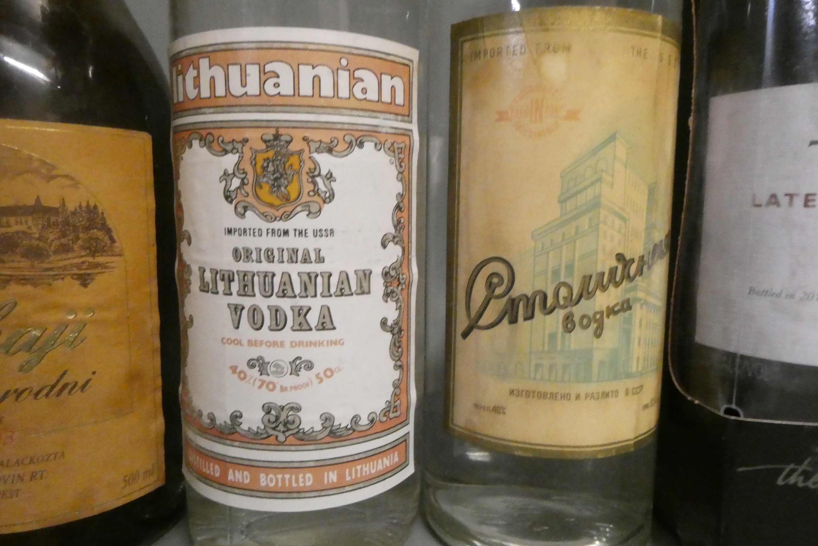 Four bottles of mixed alcohol, comprising a boxed Taylor's 2004 LBV port, a bottle of USSR vodka, a Image