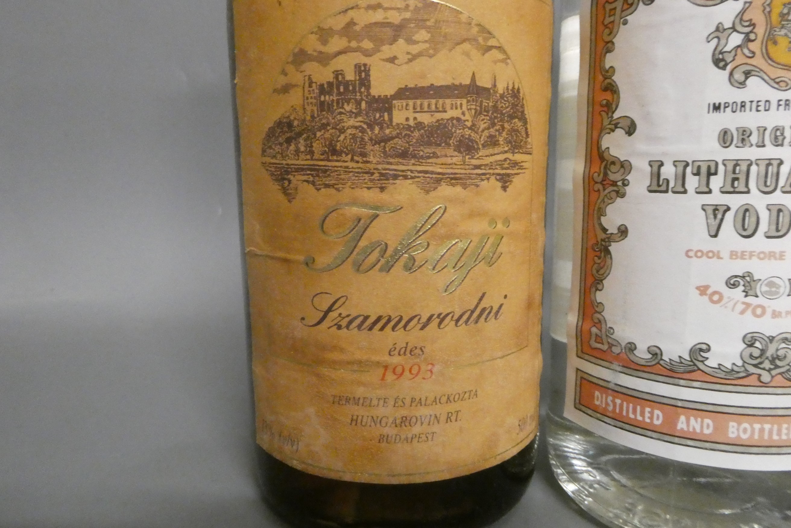 Four bottles of mixed alcohol, comprising a boxed Taylor's 2004 LBV port, a bottle of USSR vodka, a Image