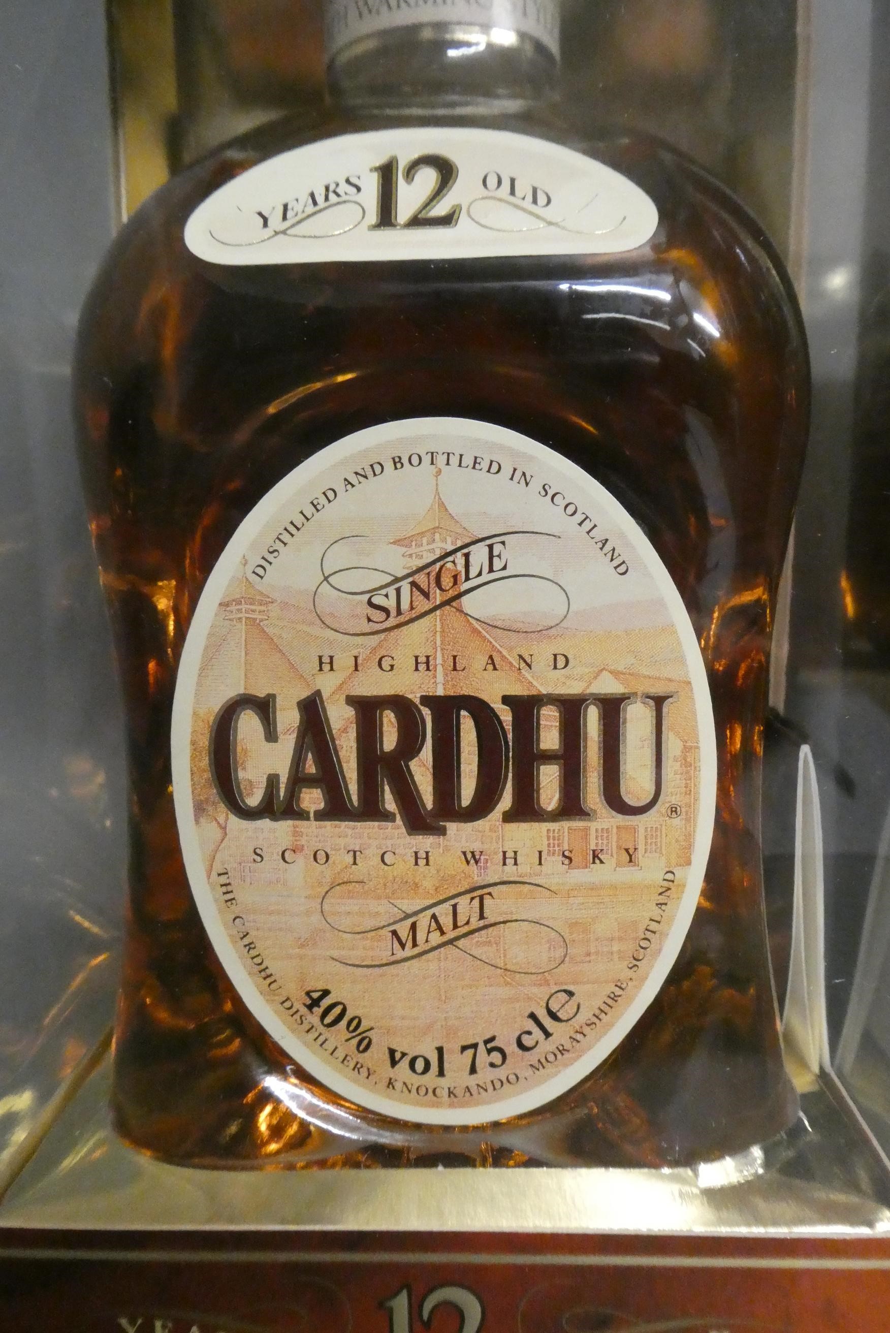 Two boxed bottles of Scotch whisky, comprising a 12yr old Cardhu and a Pinwinnie Royale Scotch Image