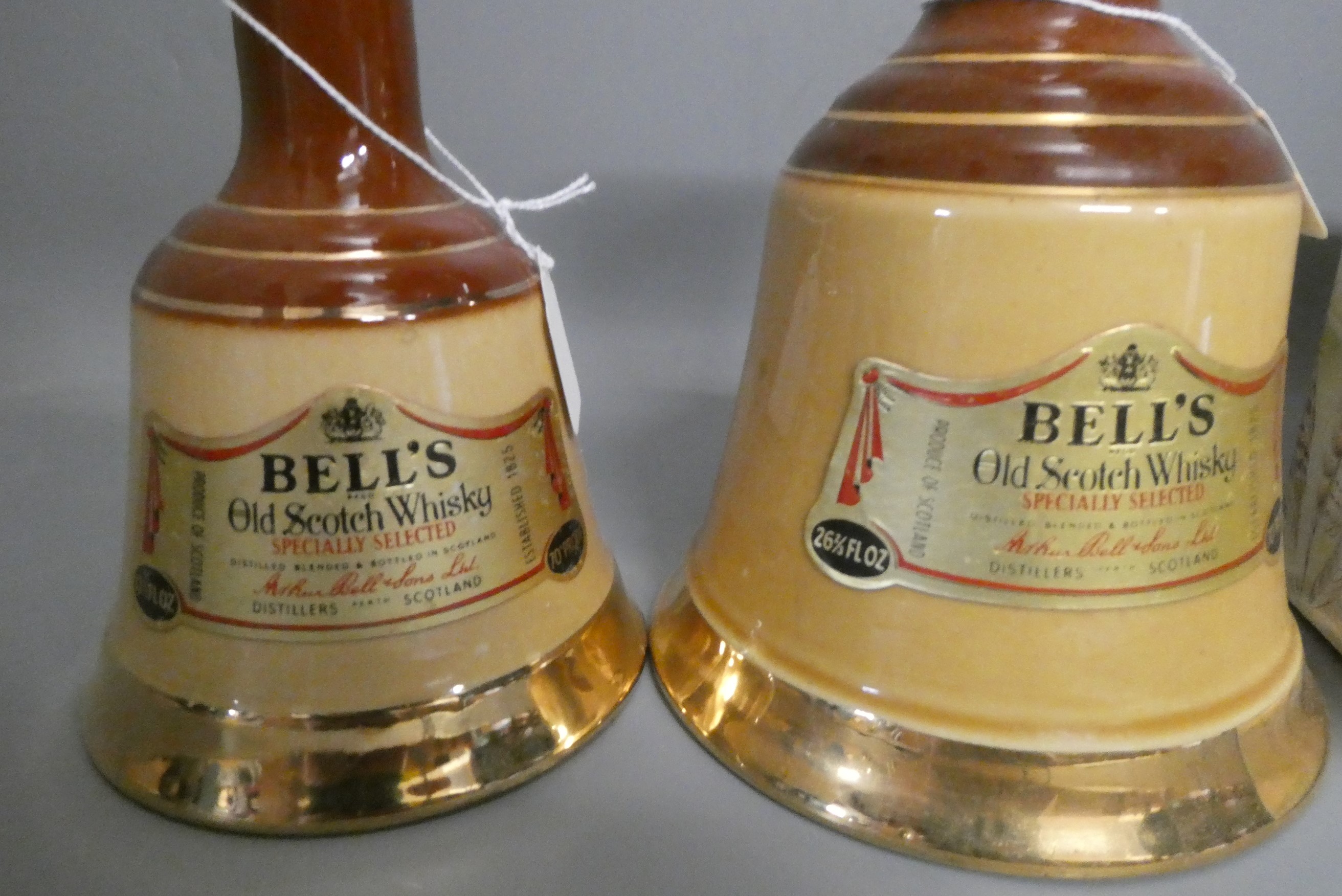 Two Whyte & Mackay Royal Doulton owl whisky decanters, boxed, together with a 26 3/4 fl. ozs. and a Image