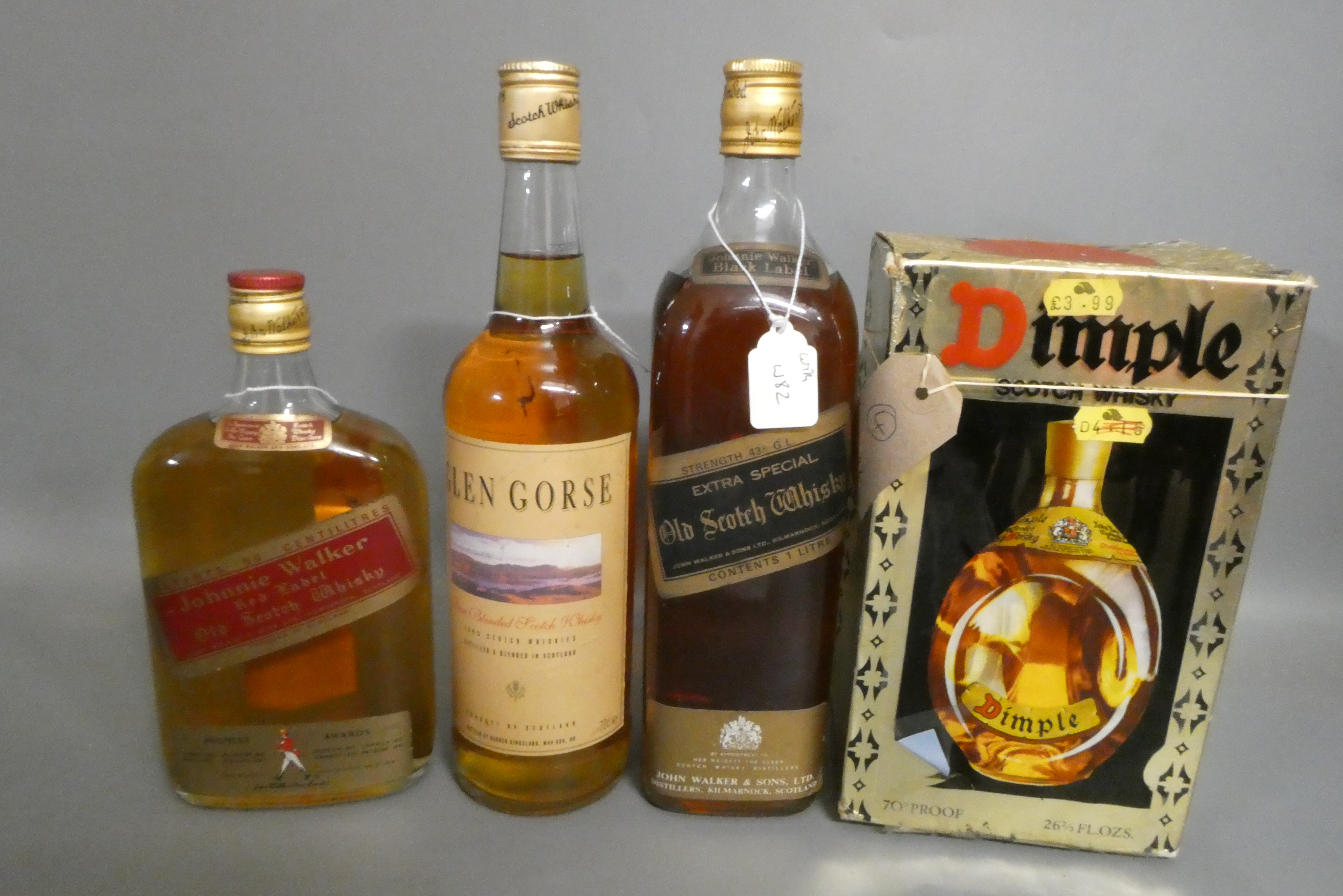 Four bottles of whisky, comprising 1litre Johnnie Walker Black Label, a 500ml Johnnie Walker Red Image