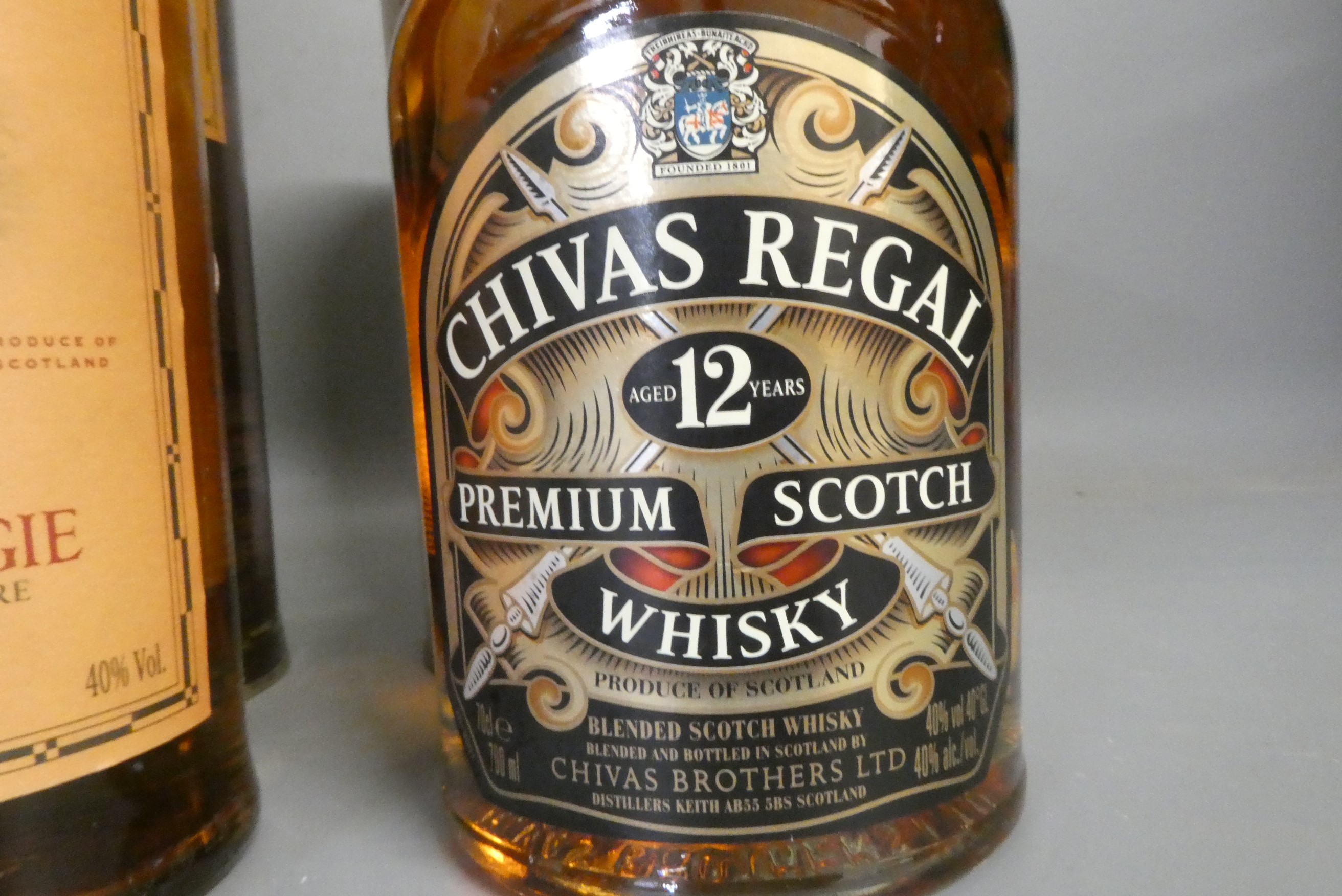 Three boxed bottles whisky, comprising a 10yr old Glenkinchie, a 12yr old Chivas Regal and a 10yr Image