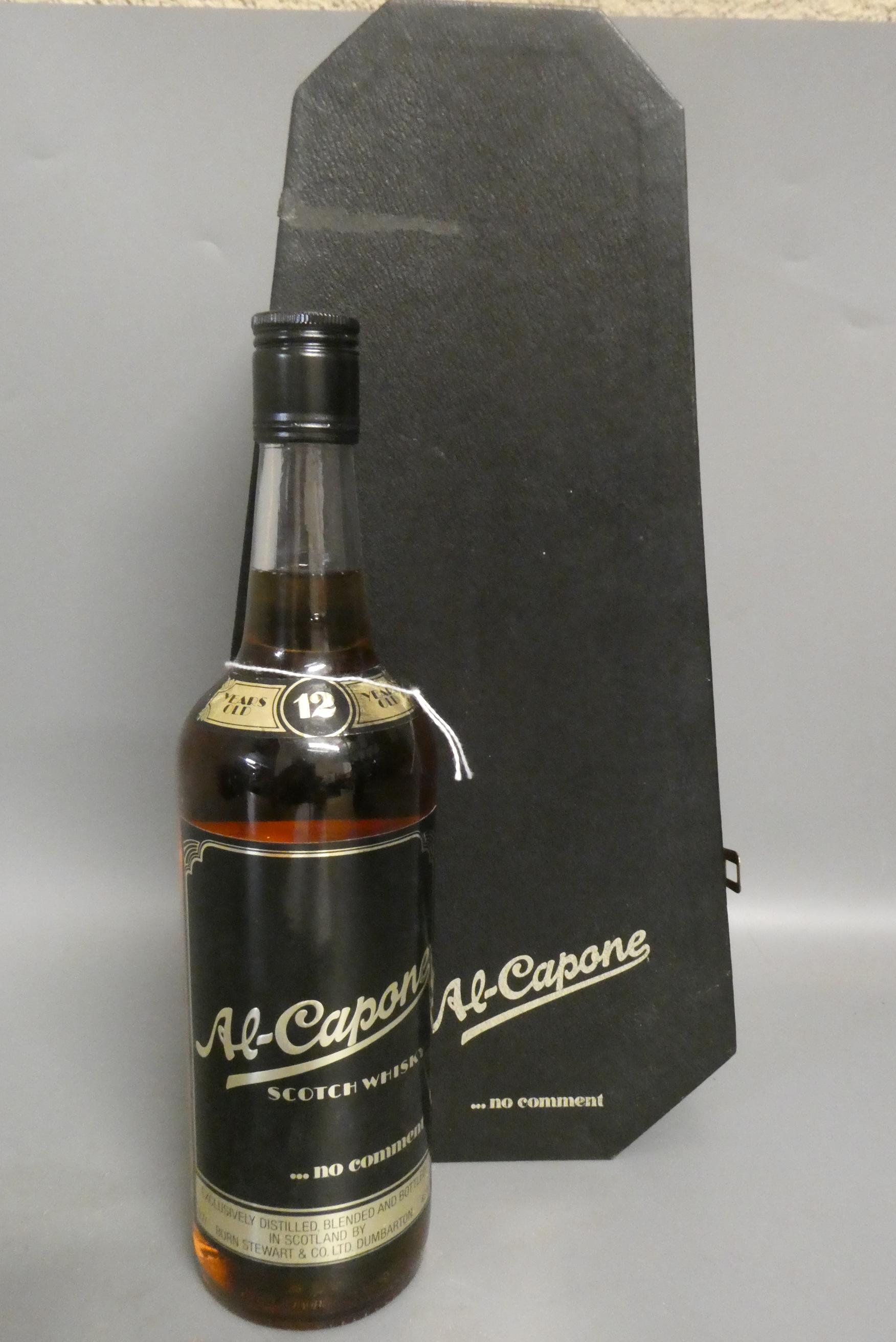 One bottle Al-Capone 12yr old whisky, Stewart & Co., boxed (Est. plus 24% premium inc. VAT) Image