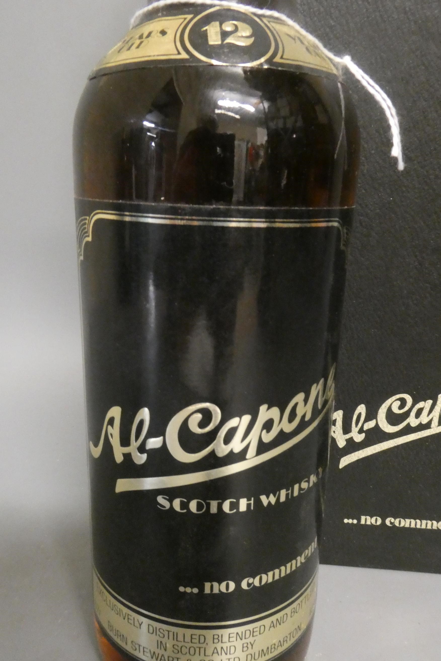 One bottle Al-Capone 12yr old whisky, Stewart & Co., boxed (Est. plus 24% premium inc. VAT) Image