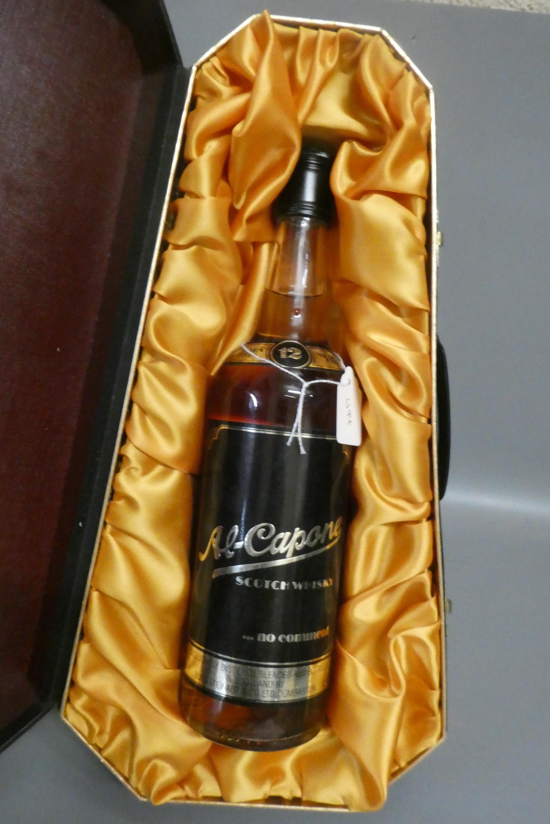One bottle Al-Capone 12yr old whisky, Stewart & Co., boxed (Est. plus 24% premium inc. VAT) Image