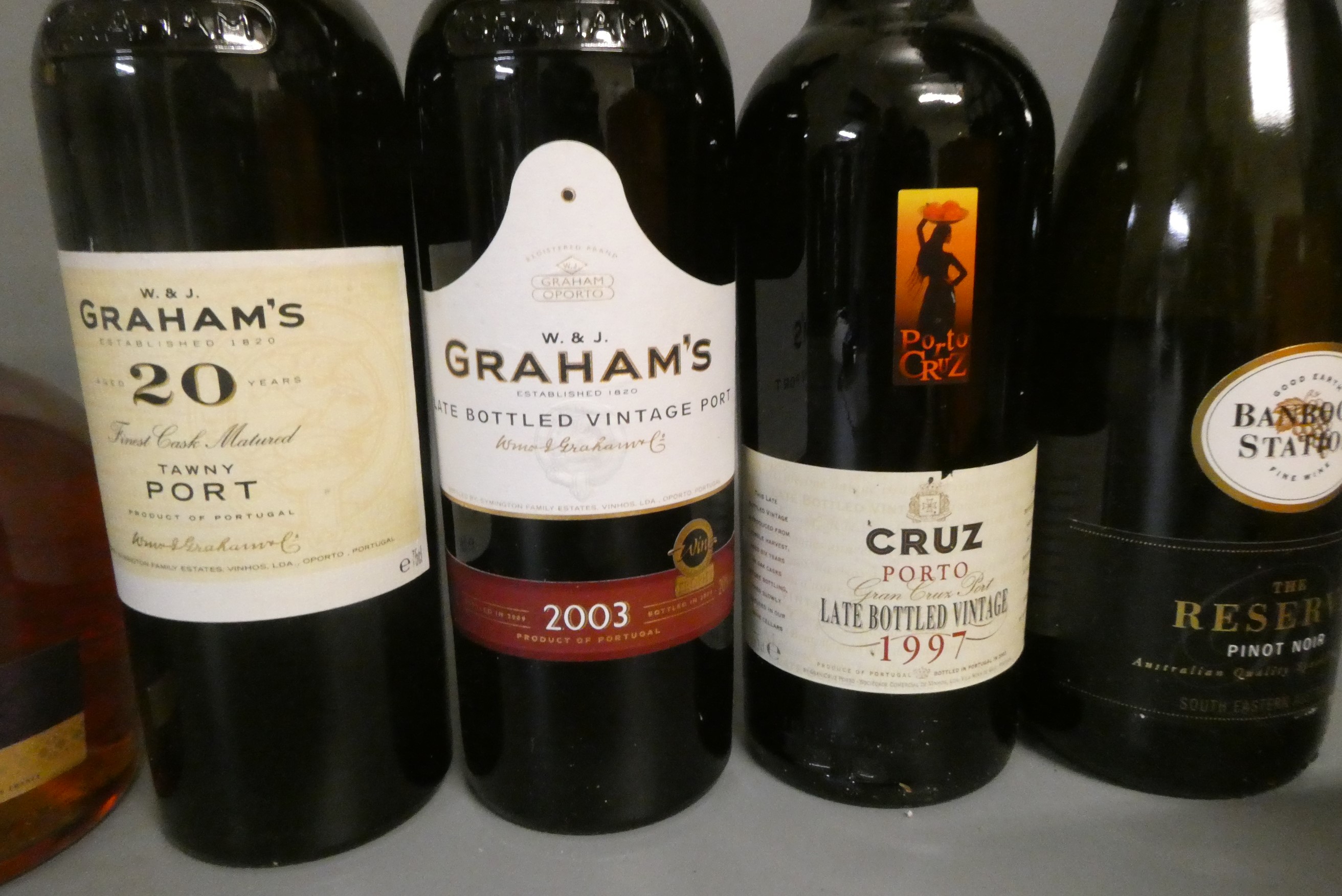 Seven bottles of mixed wine Image